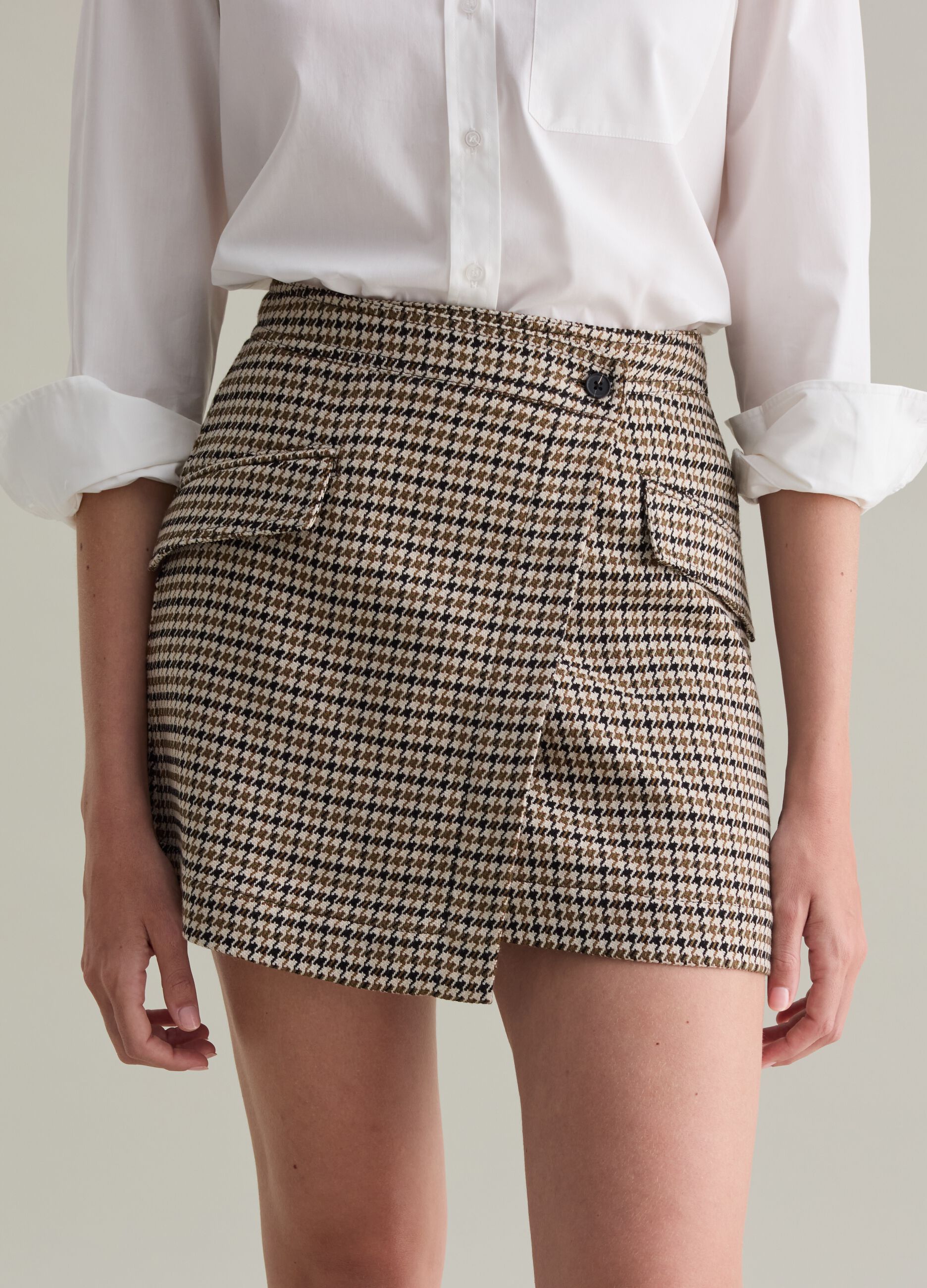 Wraparound houndstooth miniskirt