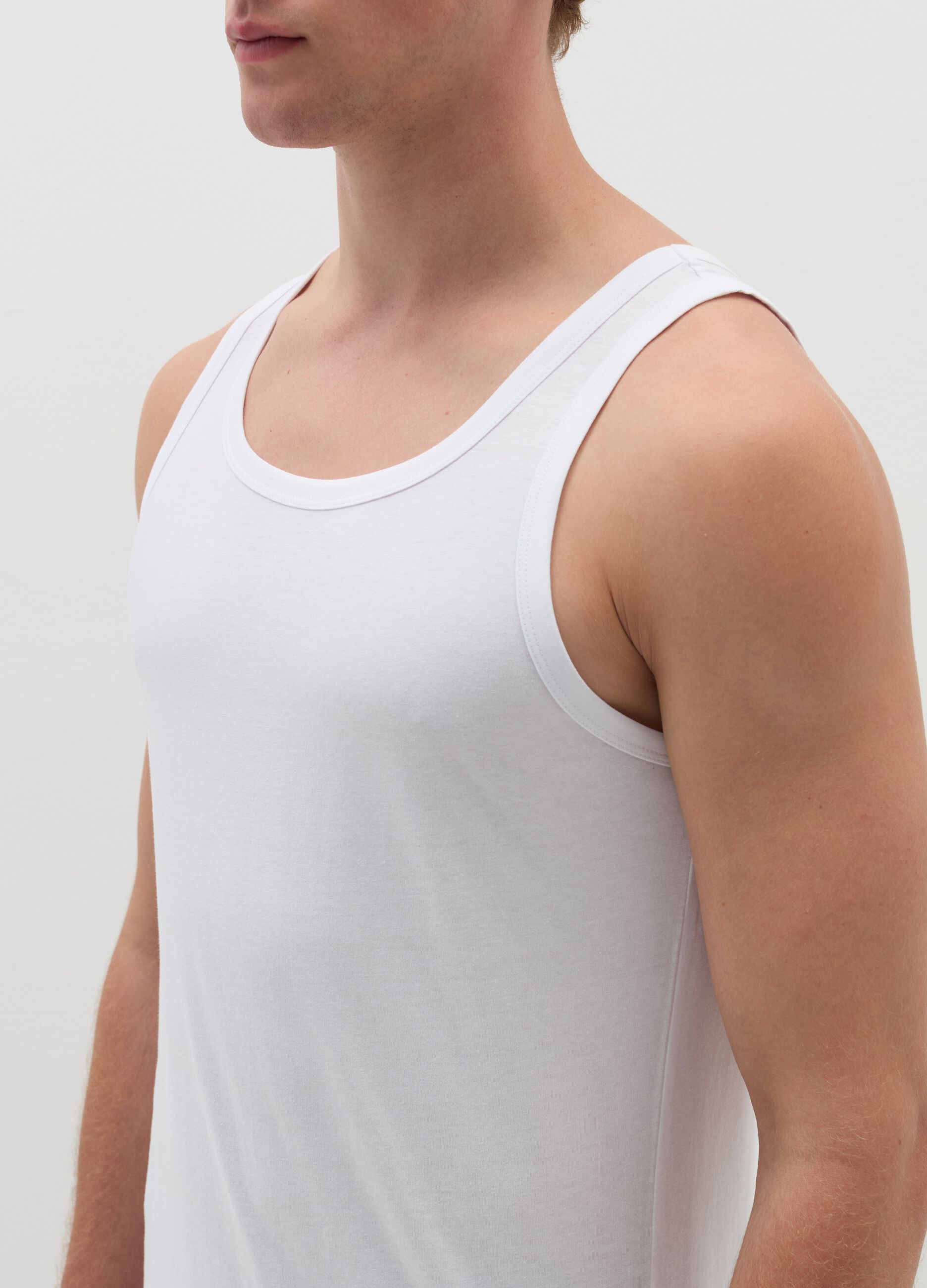 Three-pack racerback vests in organic cotton