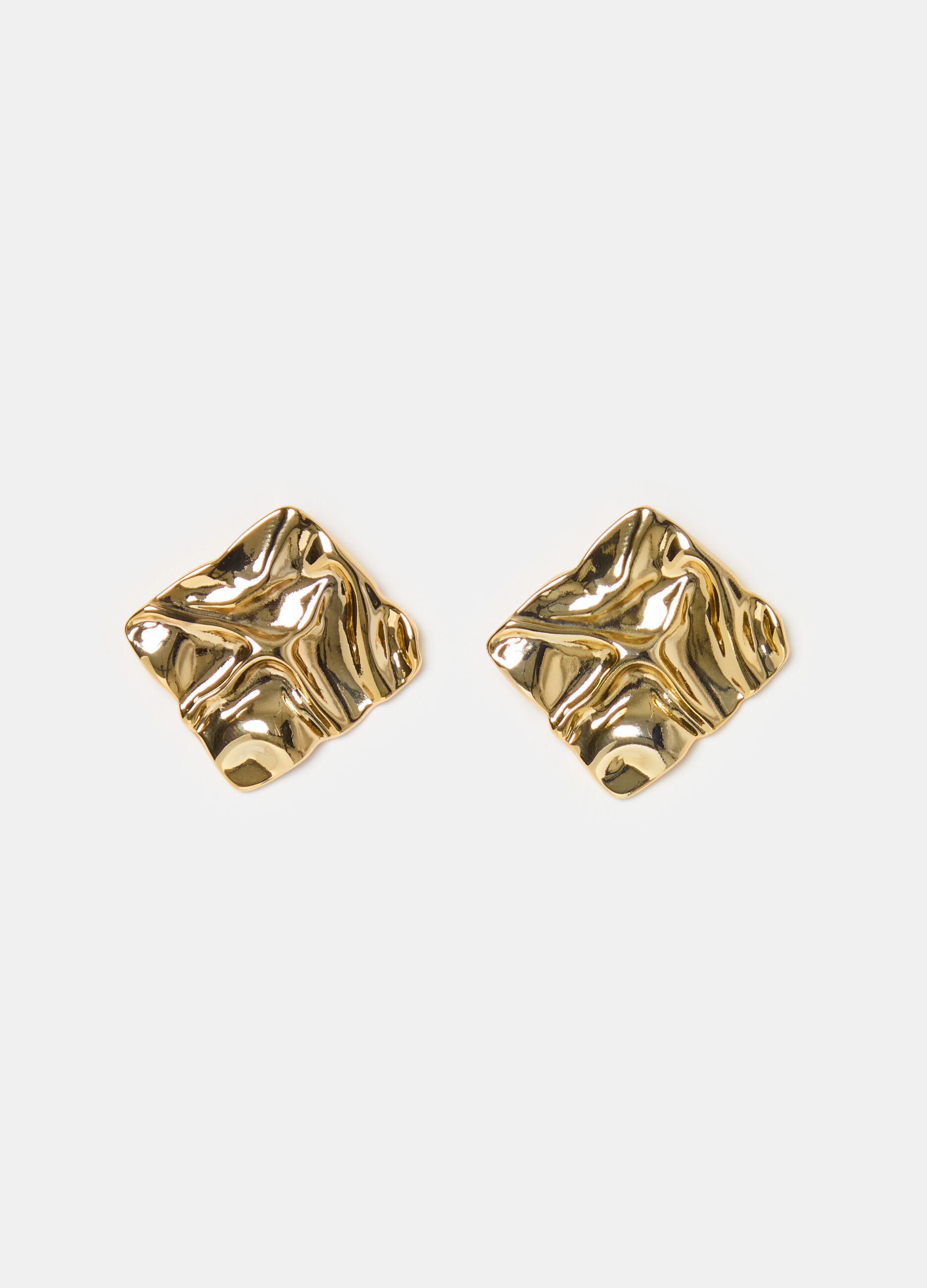 Earrings with raised design