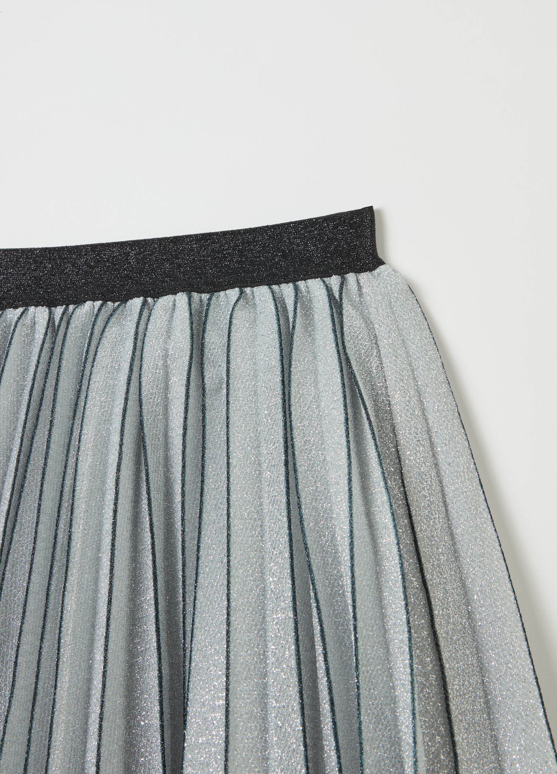 Short pleated skirt in lurex