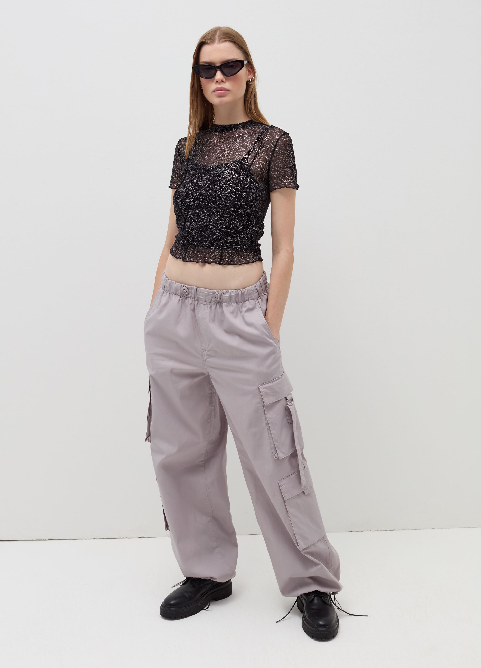 Crop T-shirt in mesh with wavy edging