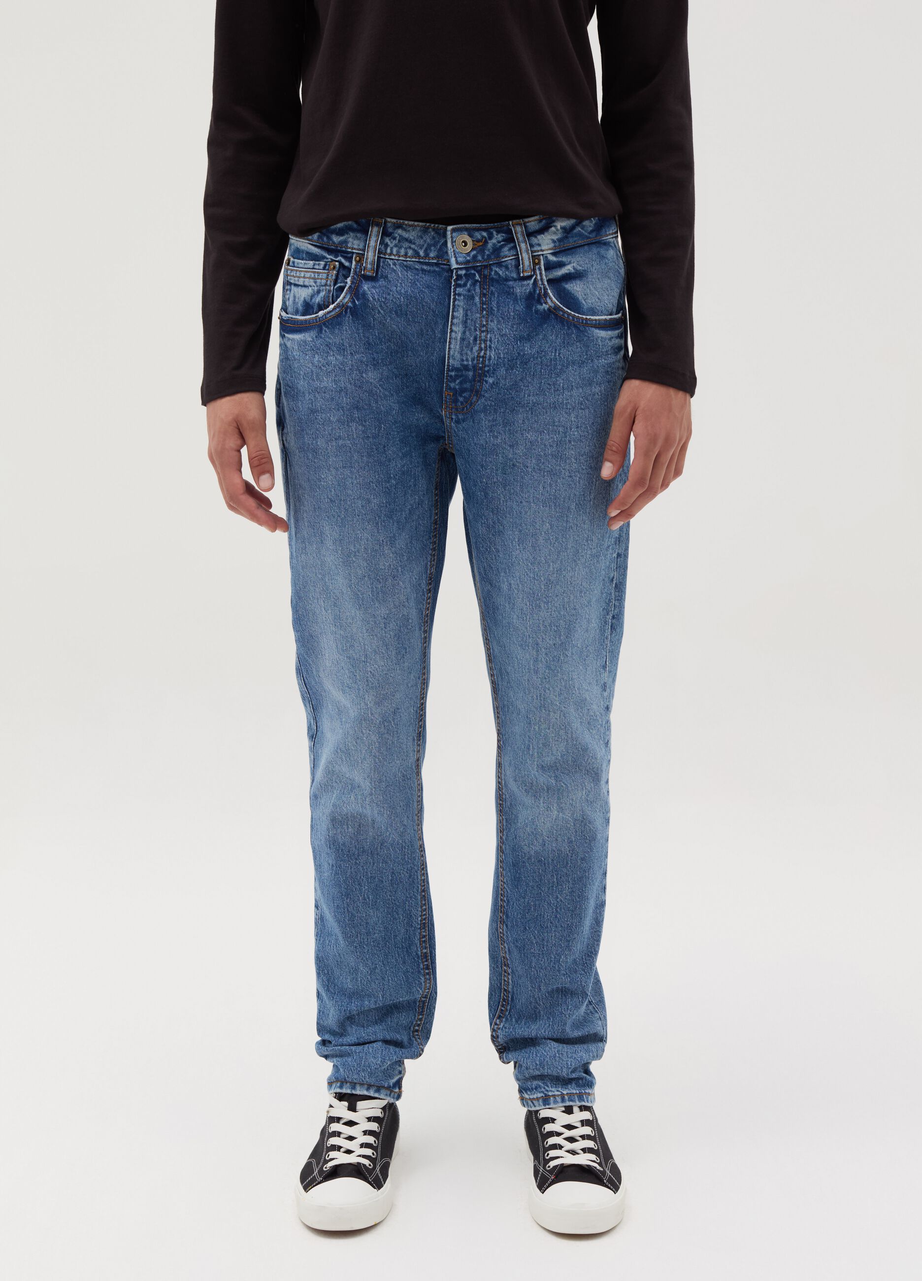 Slim-fit acid-wash jeans with fading