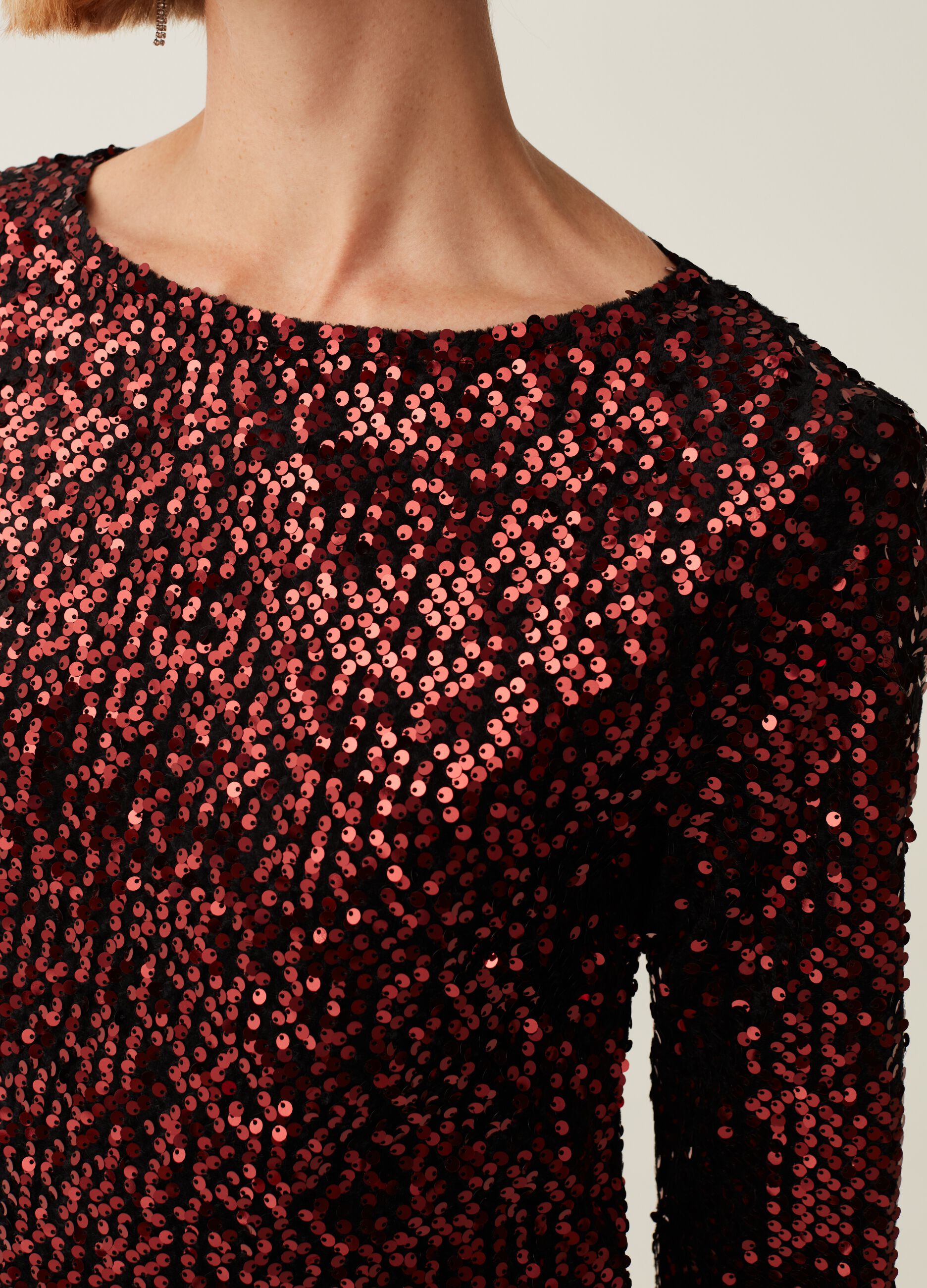 Dress with sequins and three-quarter sleeves