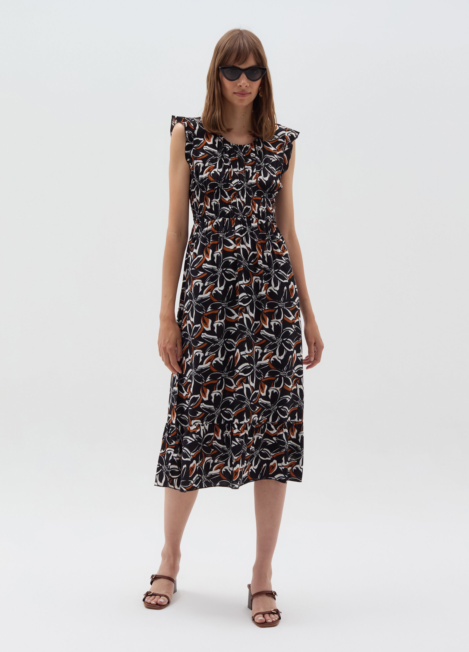 Long floral dress with smock stitch