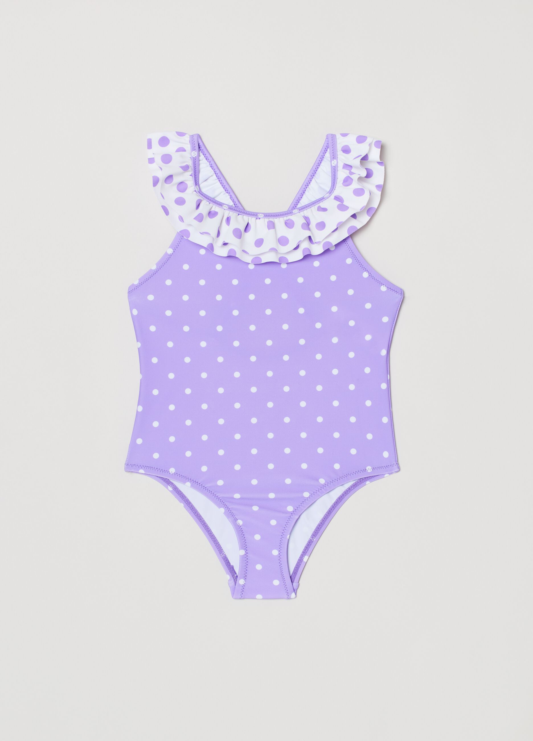 One-piece swimsuit with flounce and polka dot print