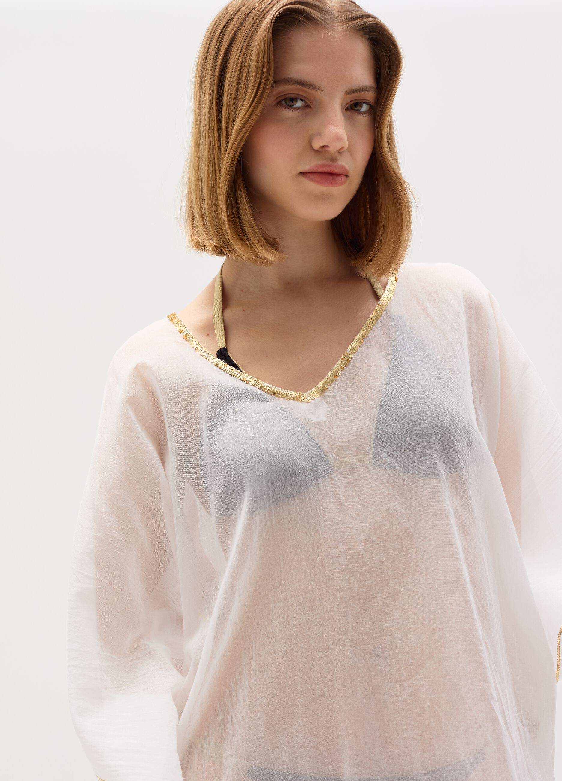 Beach cover-up poncho with lurex edging