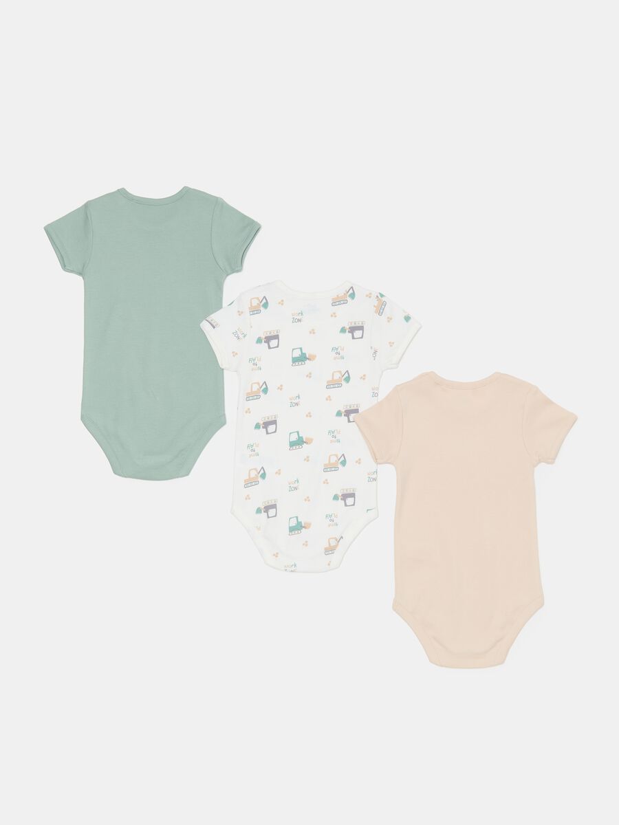 Three-pack bodysuits in organic cotton with excavator print_1