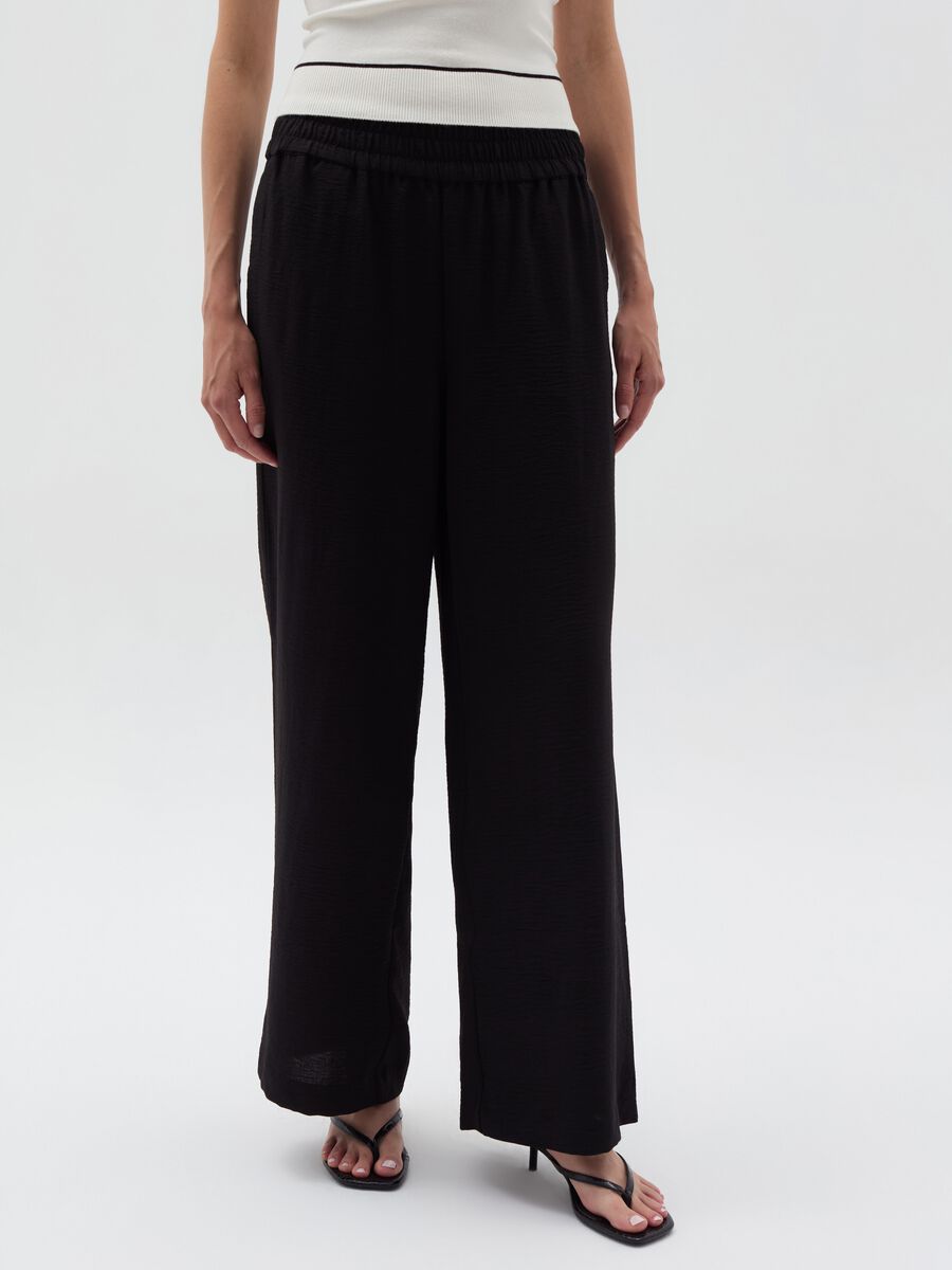 Crinkle-effect fluid trousers_1