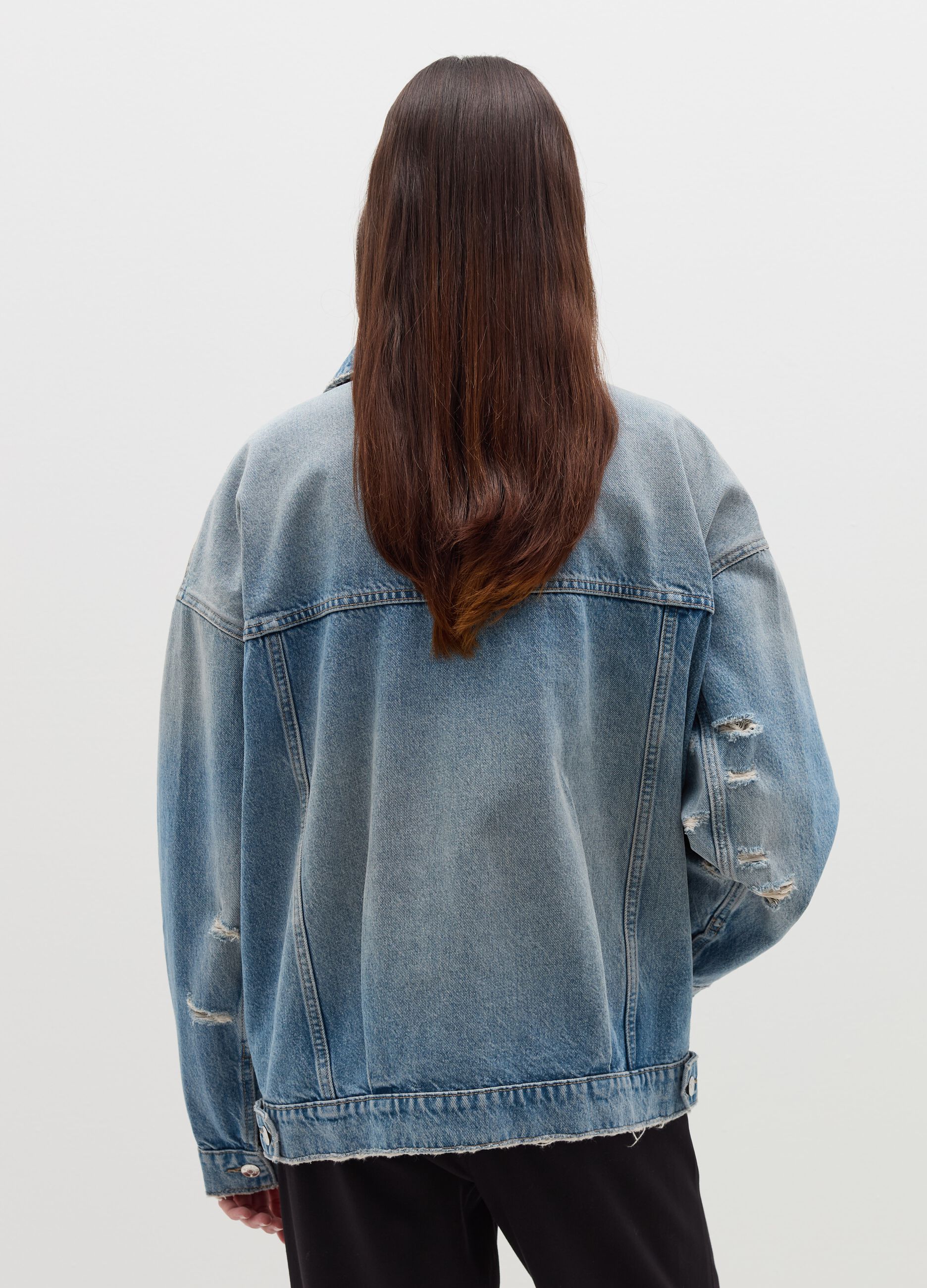 Denim jacket with abrasions