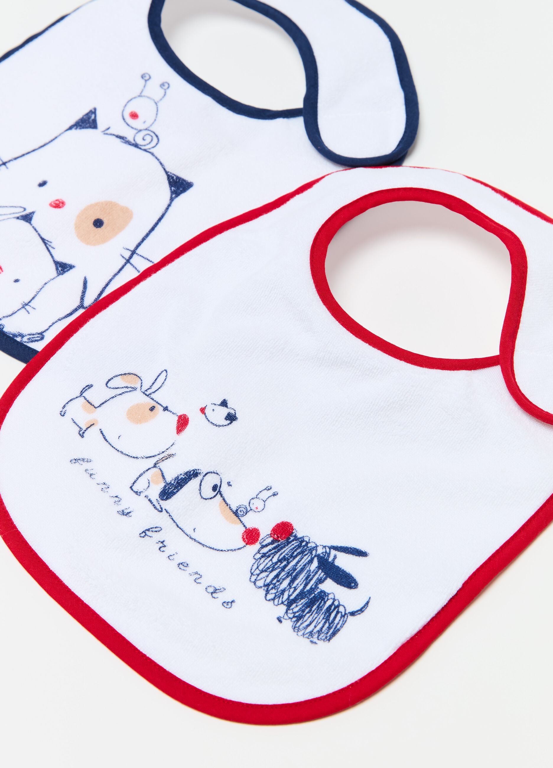 Two-pack bibs with PEVA backing and animals