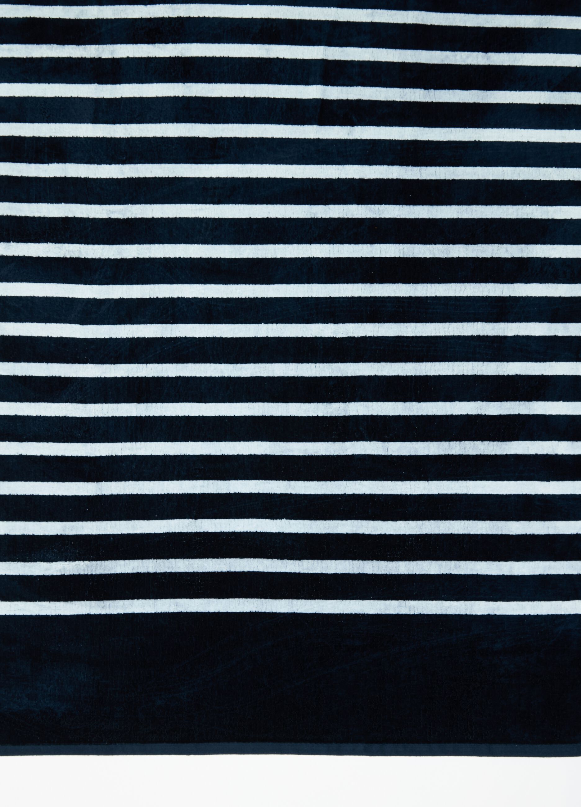 Beach towel with thin striped print