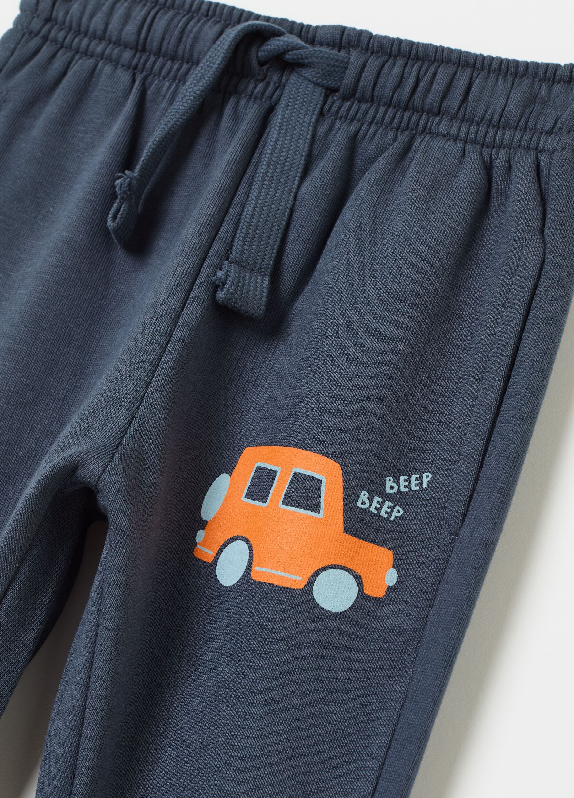 Fleece joggers with drawstring and print