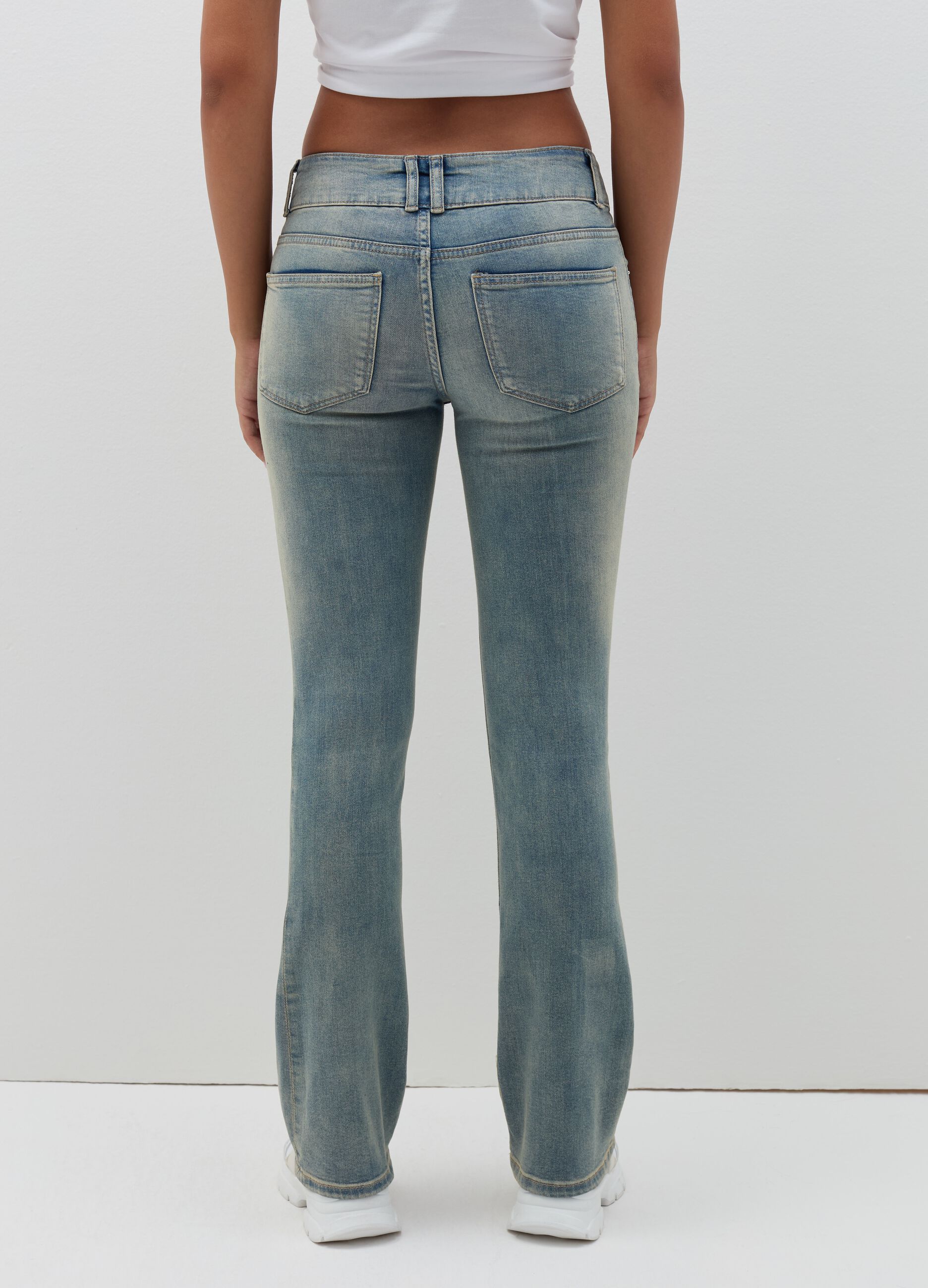 Flare-fit jeans with raised stitching