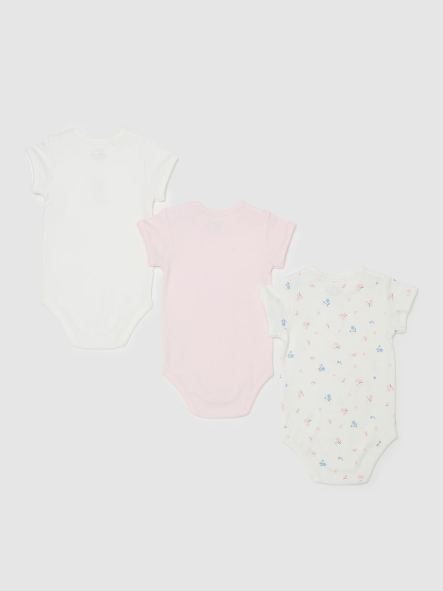 Three-pack bodysuits in organic cotton with small flowers print_1