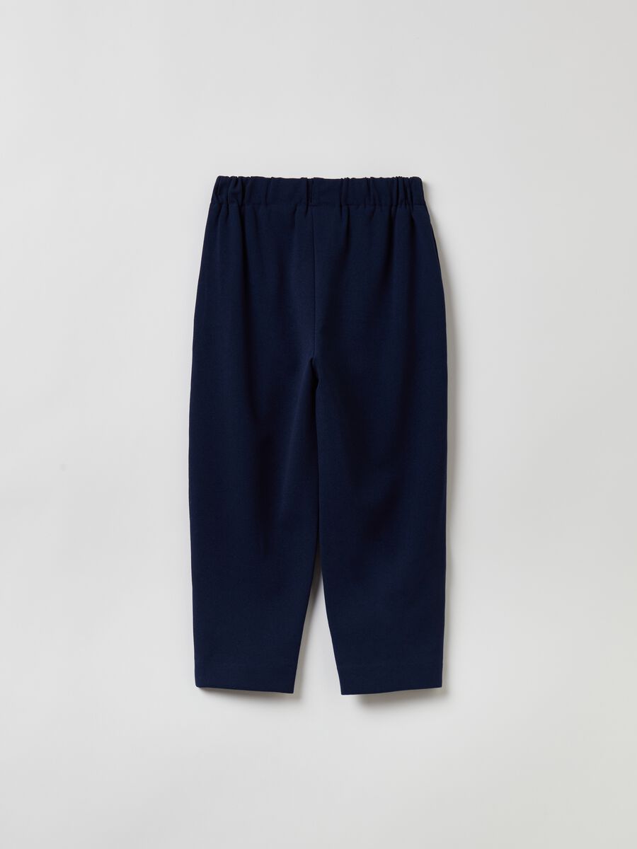 Solid colour carrot-fit trousers_1