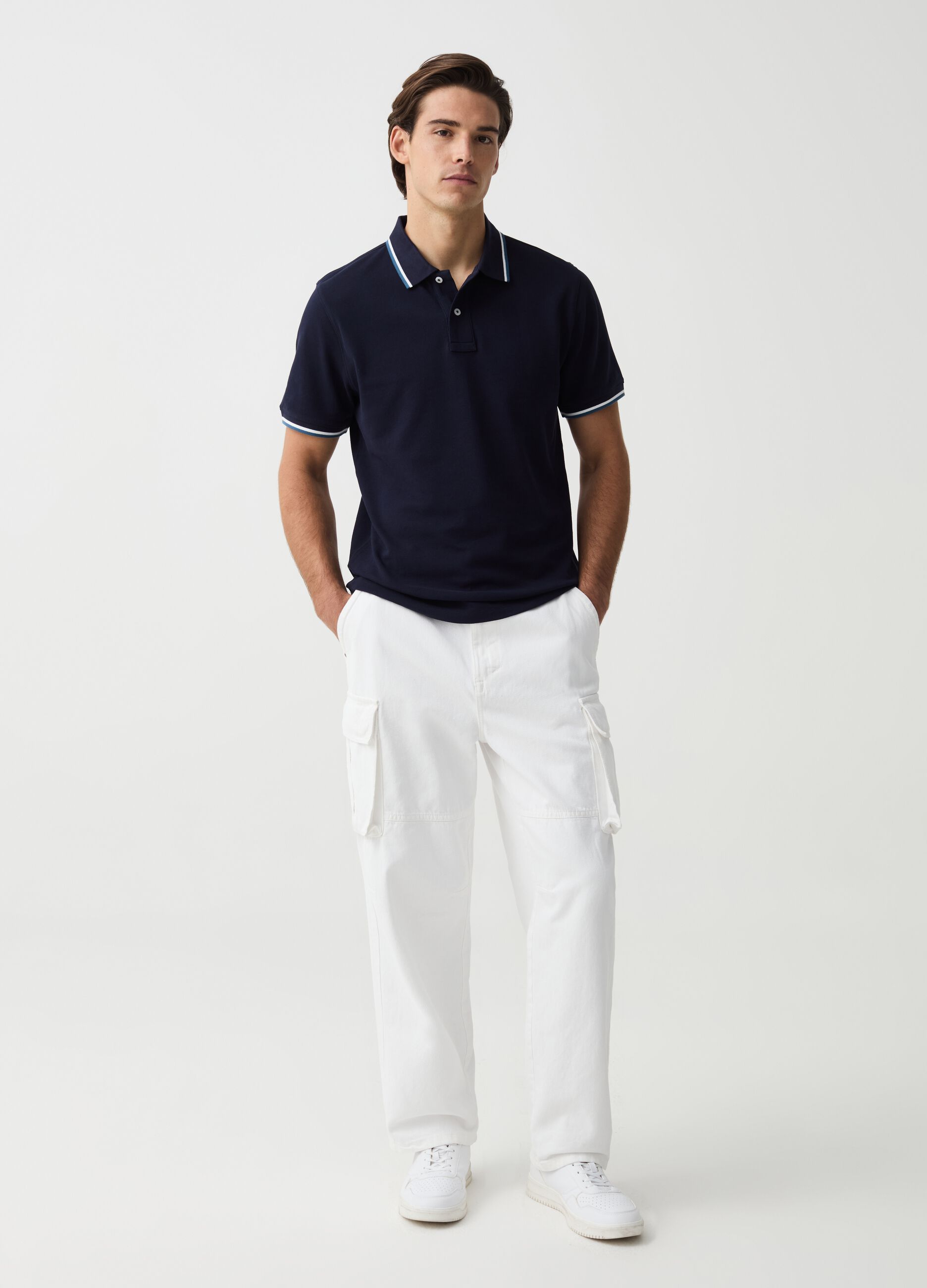 Polo shirt in piquet with striped edging