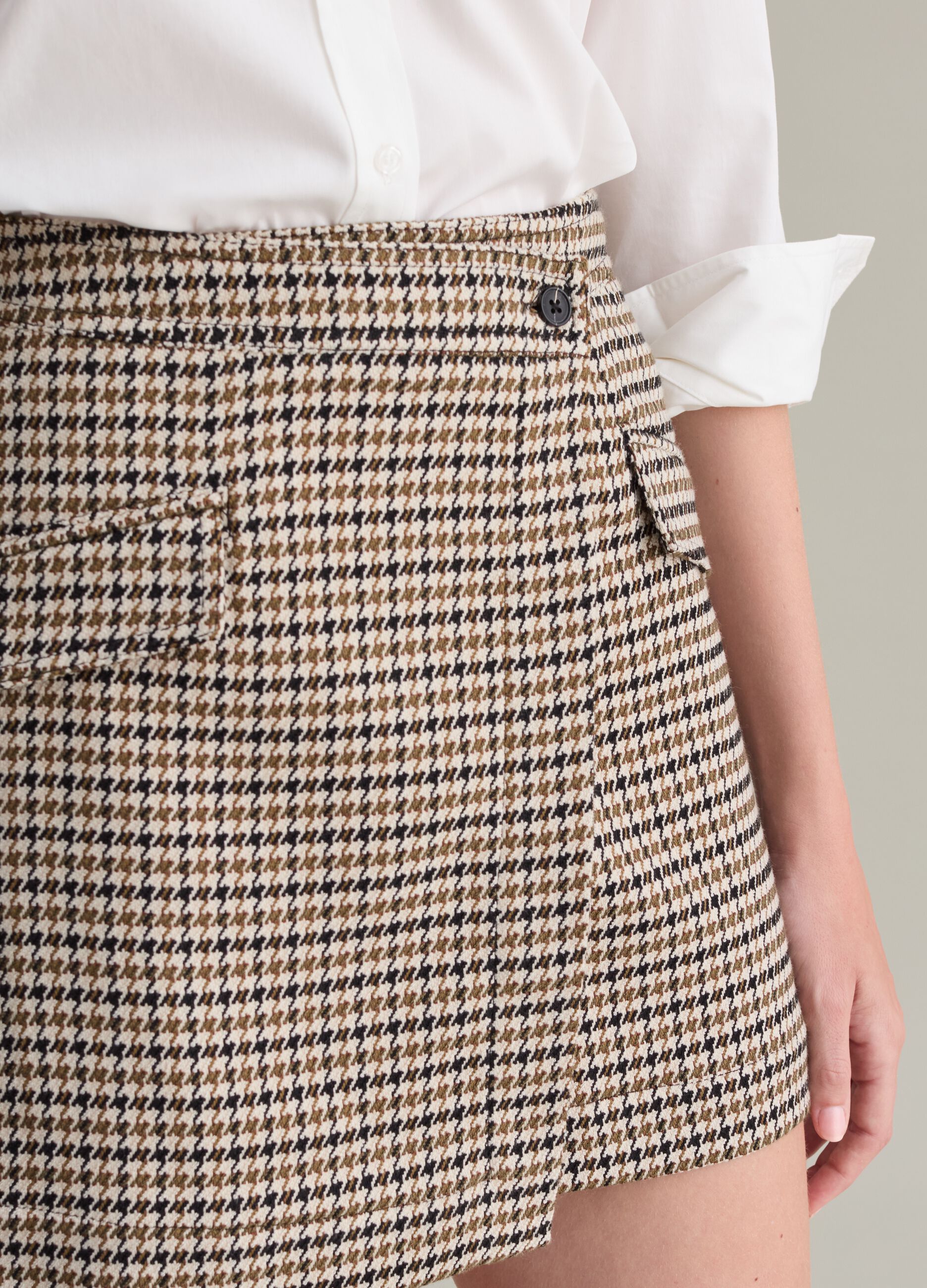 Wraparound houndstooth miniskirt