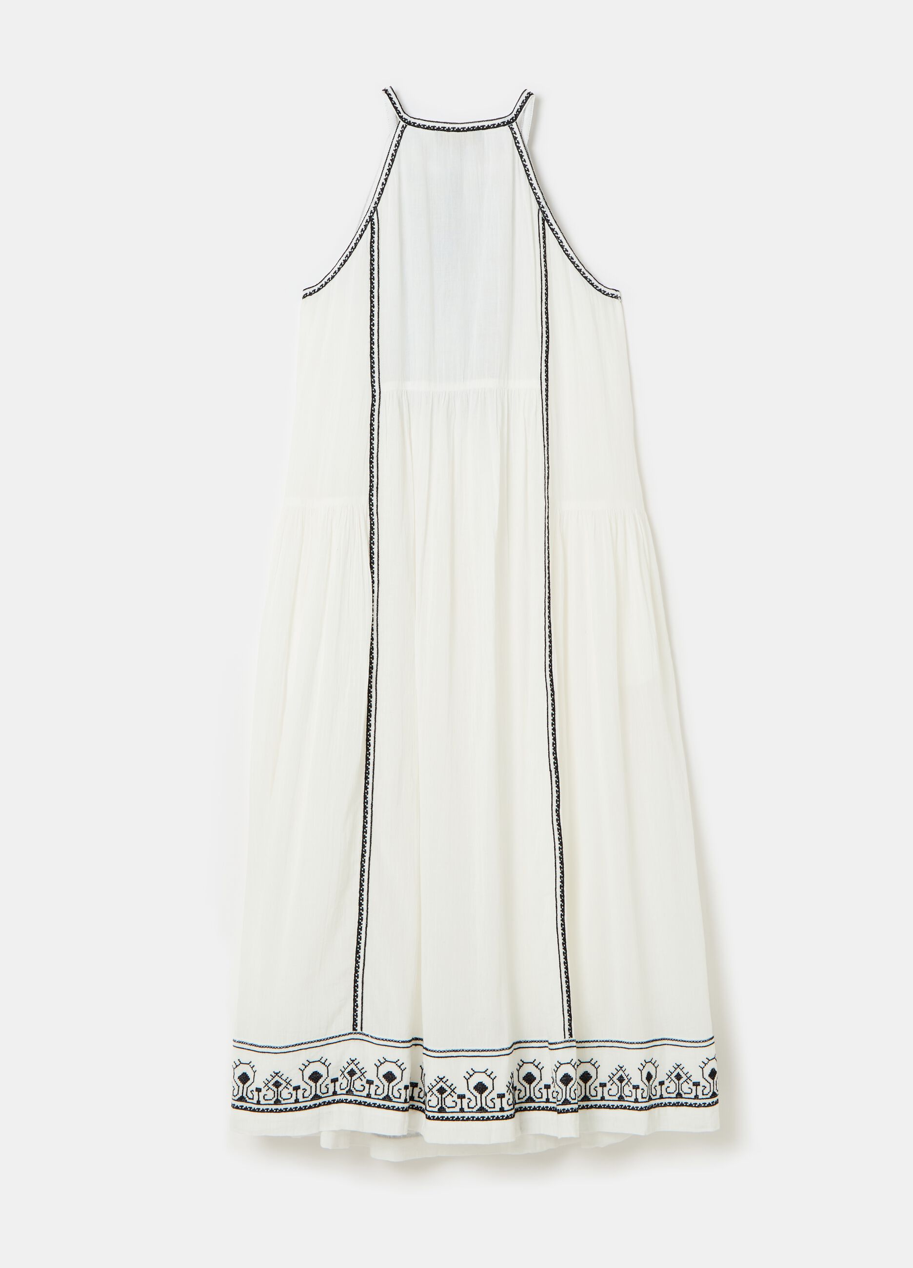 Dress with ethnic embroidery and tassels