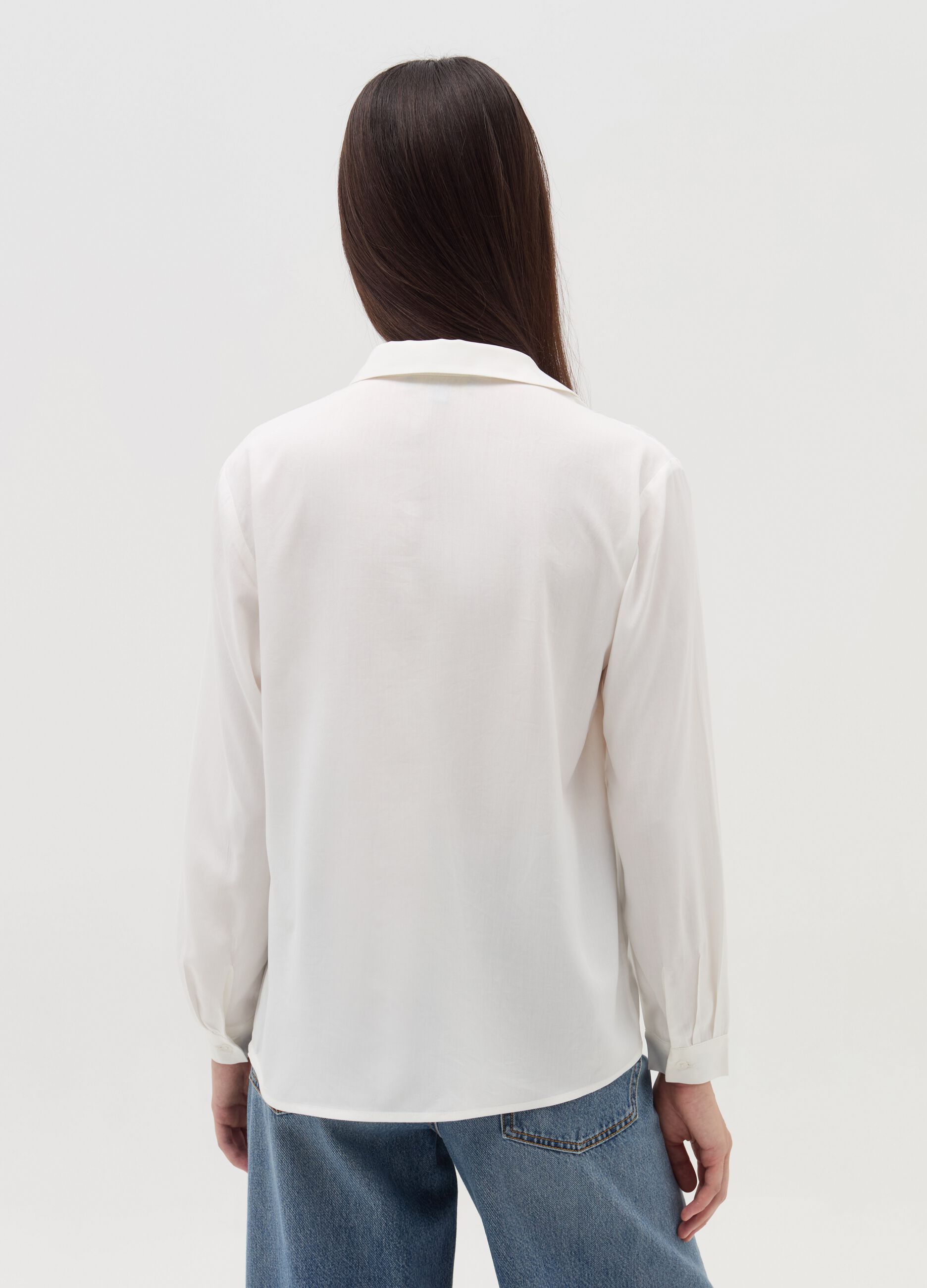 Blouse with polo neckline and long sleeves