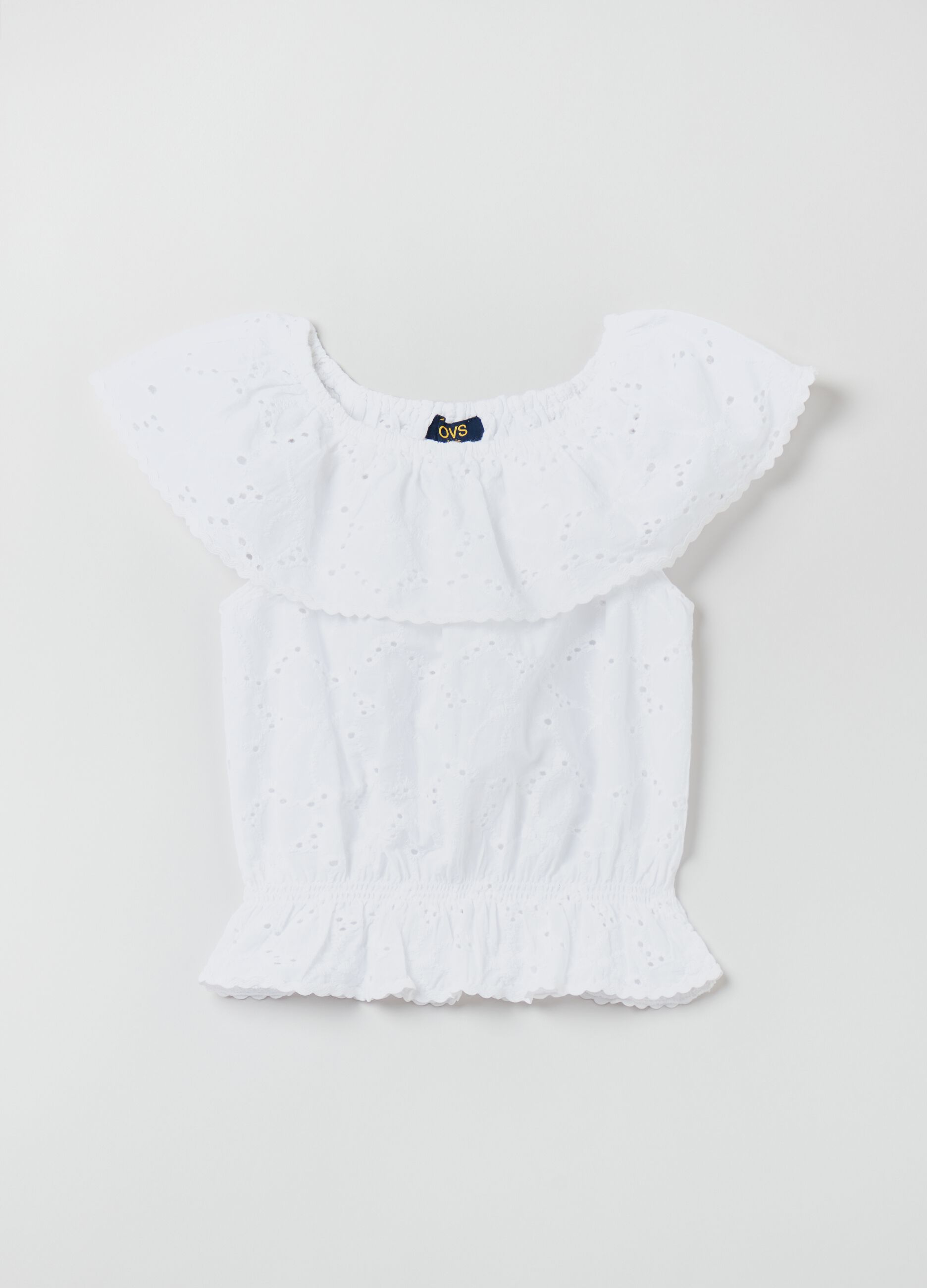 Sleeveless blouse in broderie anglaise