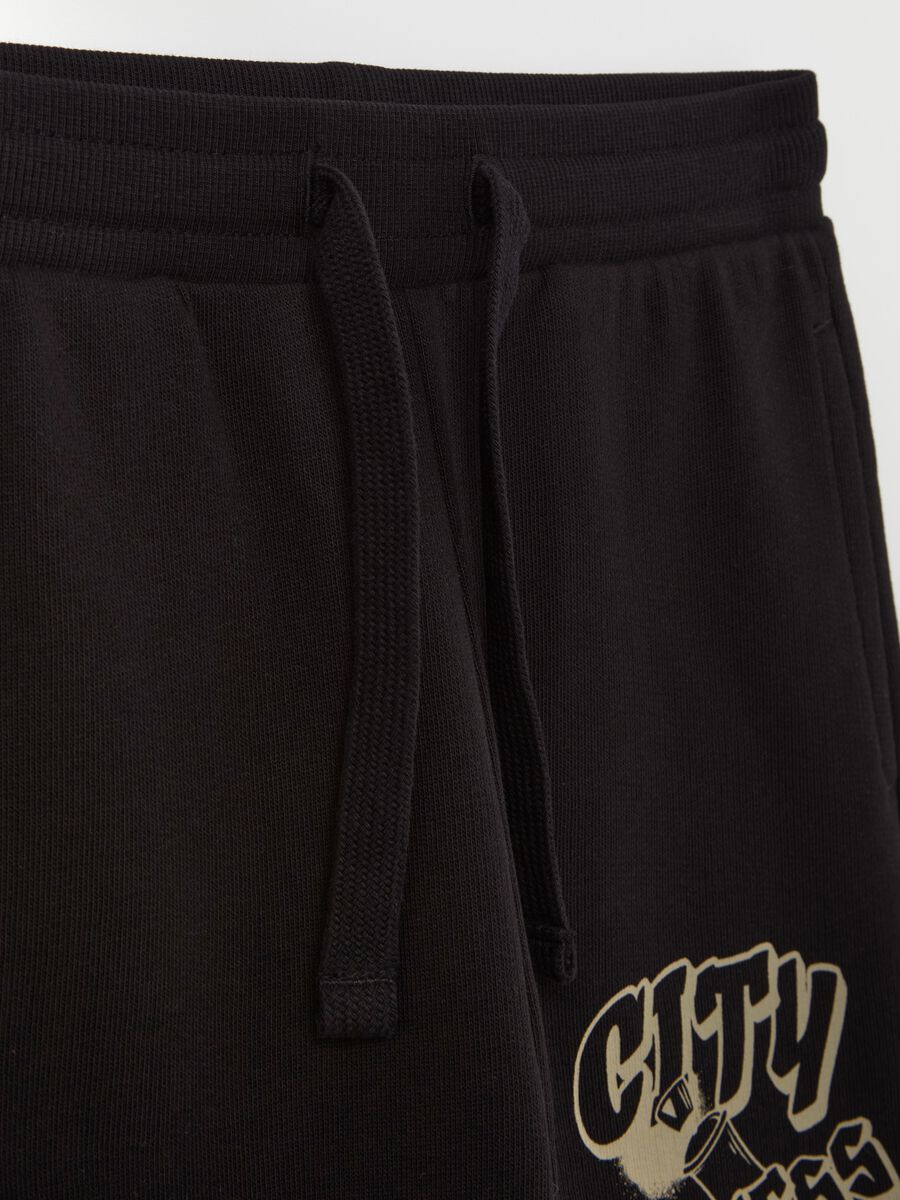 Fleece joggers with drawstring and print_2