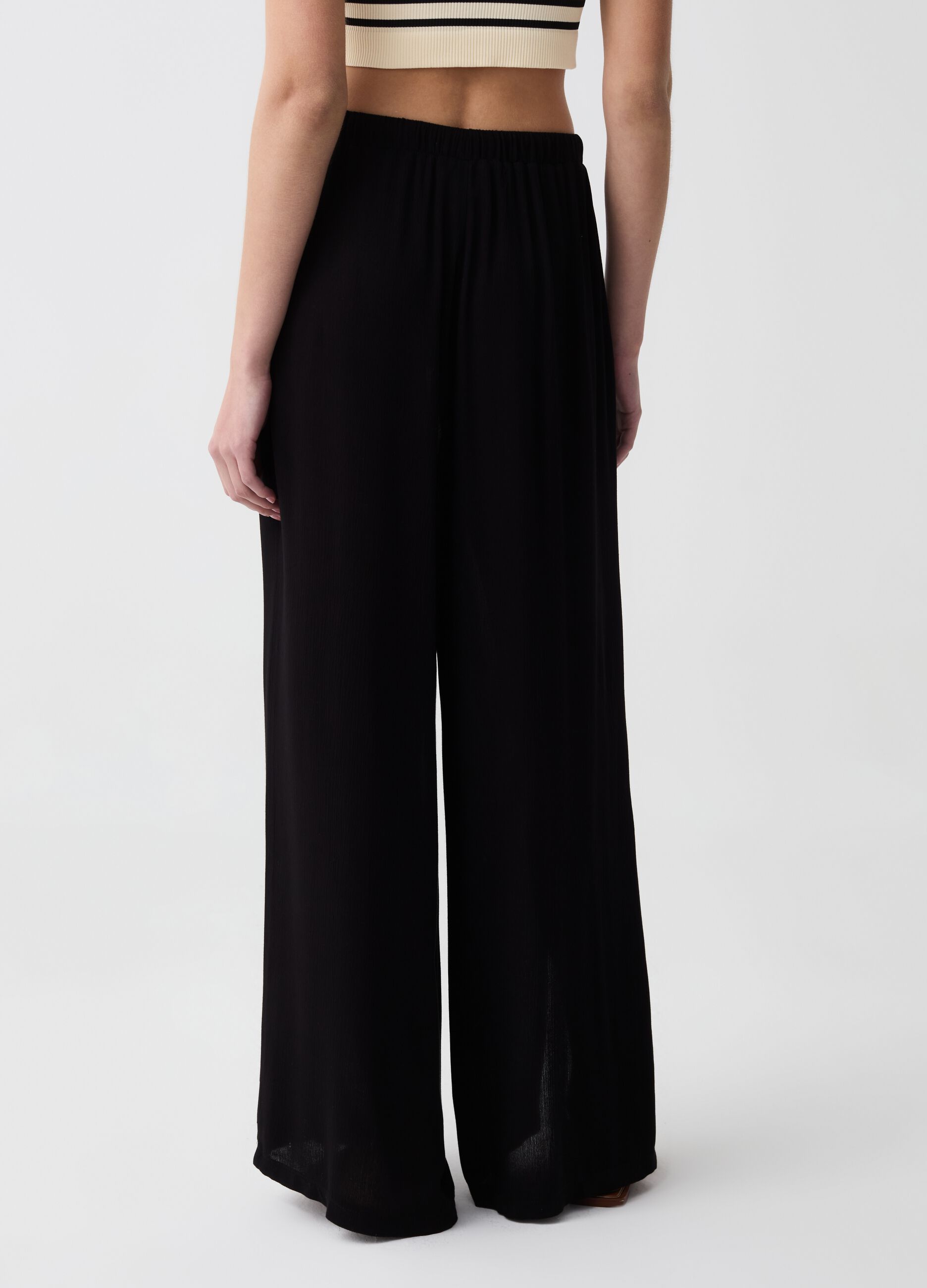 Wide-leg palazzo trousers with slits