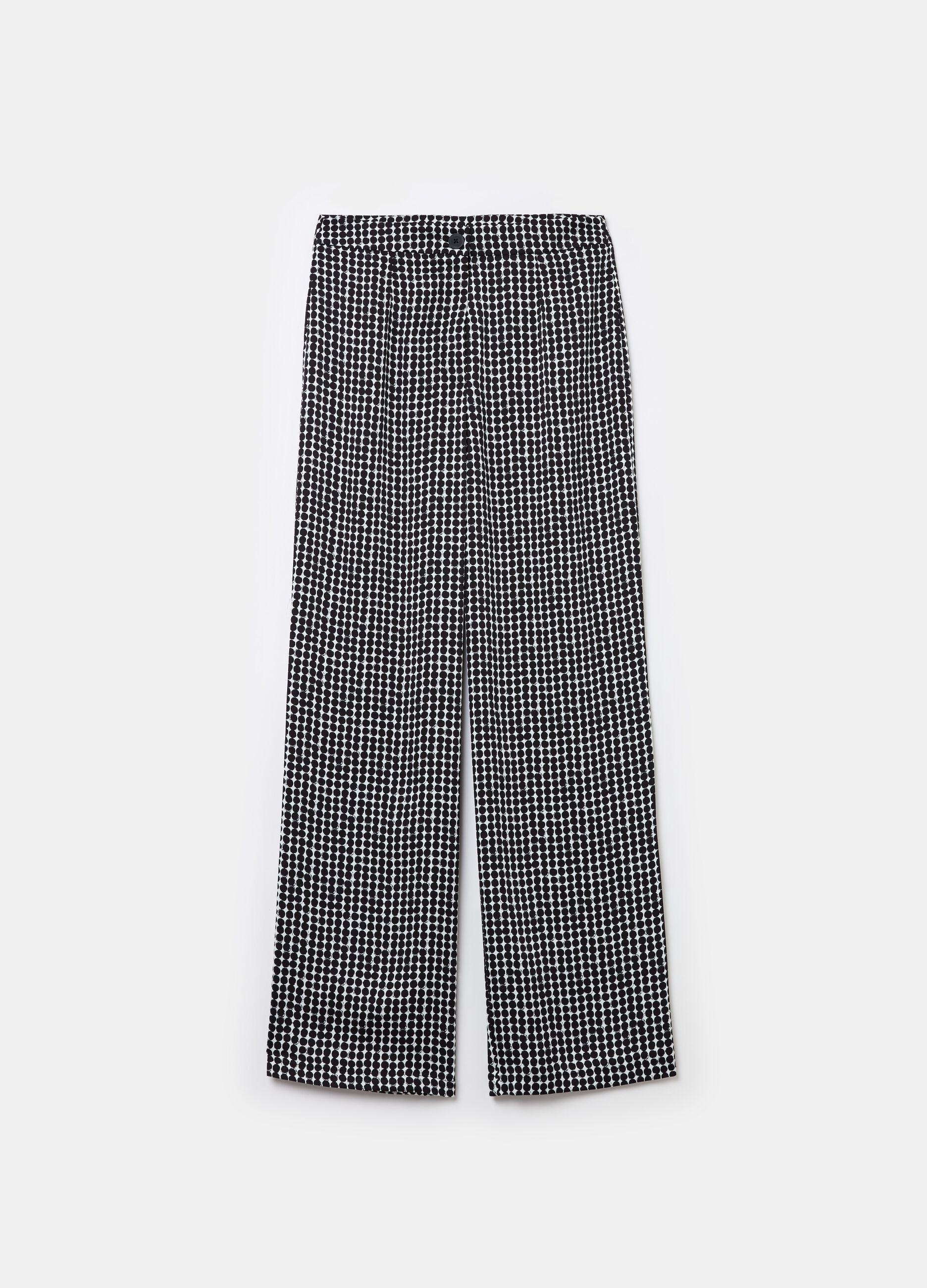 High-rise trousers with polka dot pattern