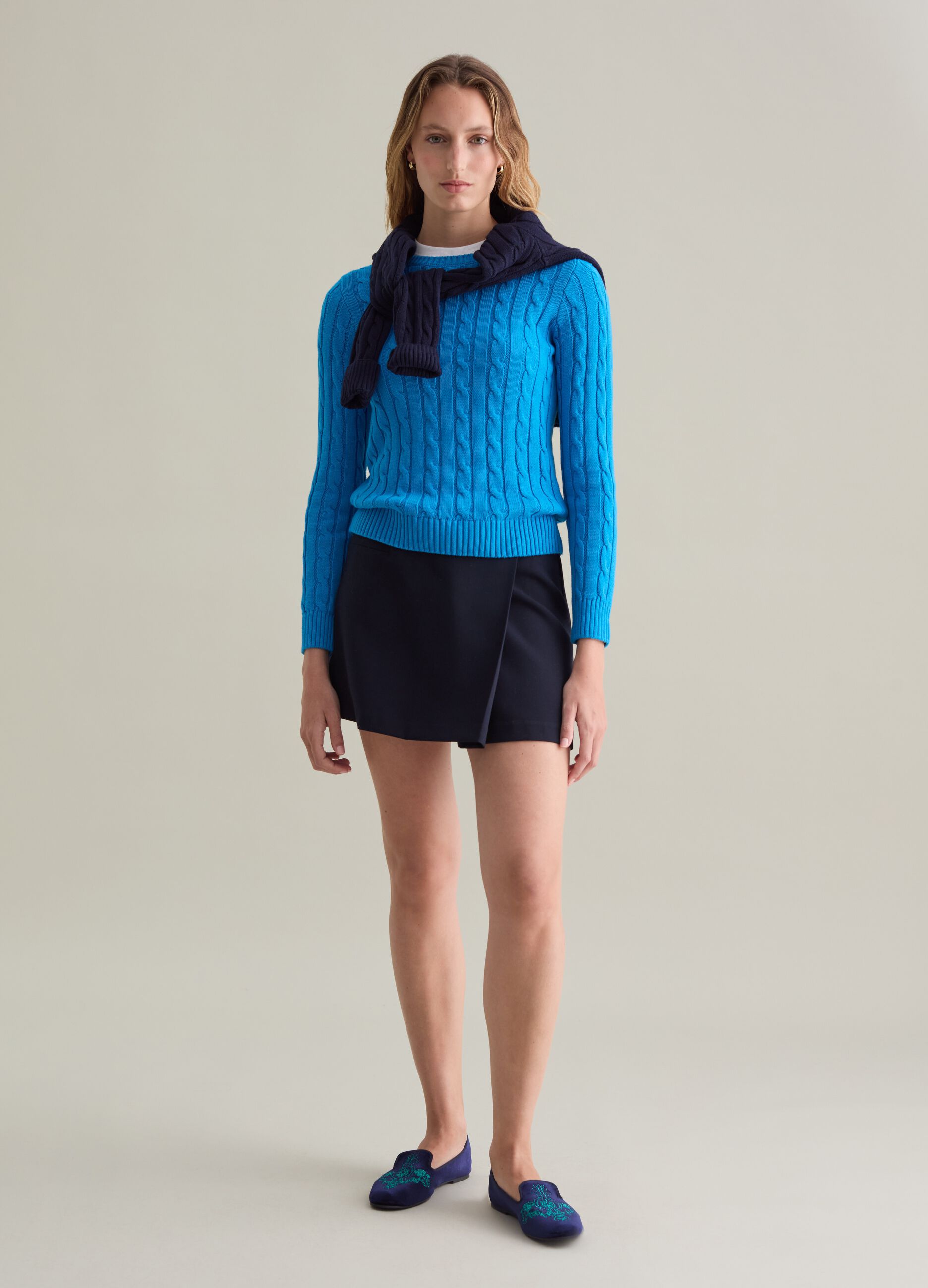 Ribbed pullover with cable-knit design