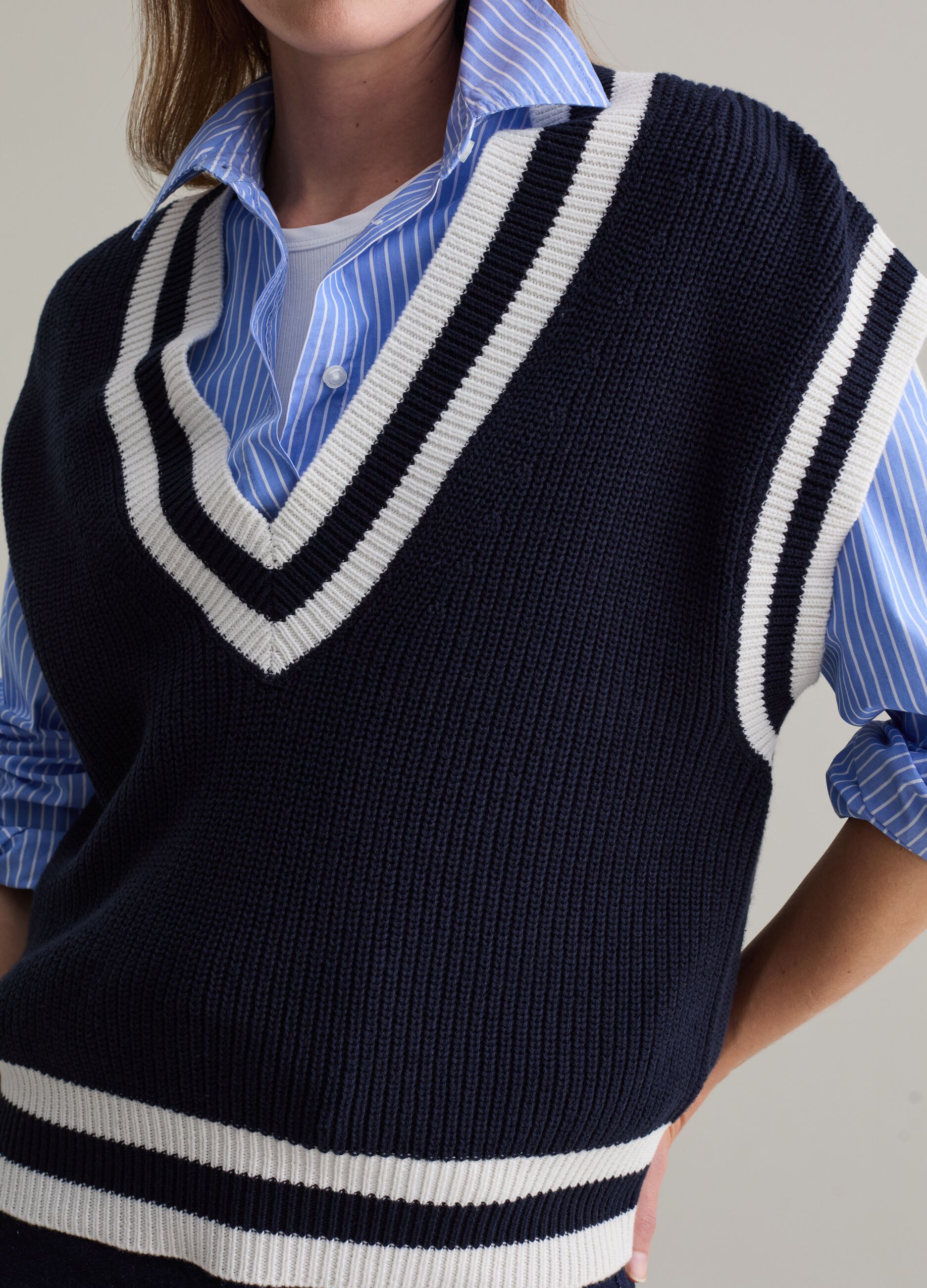 Ribbed closed gilet with striped edging