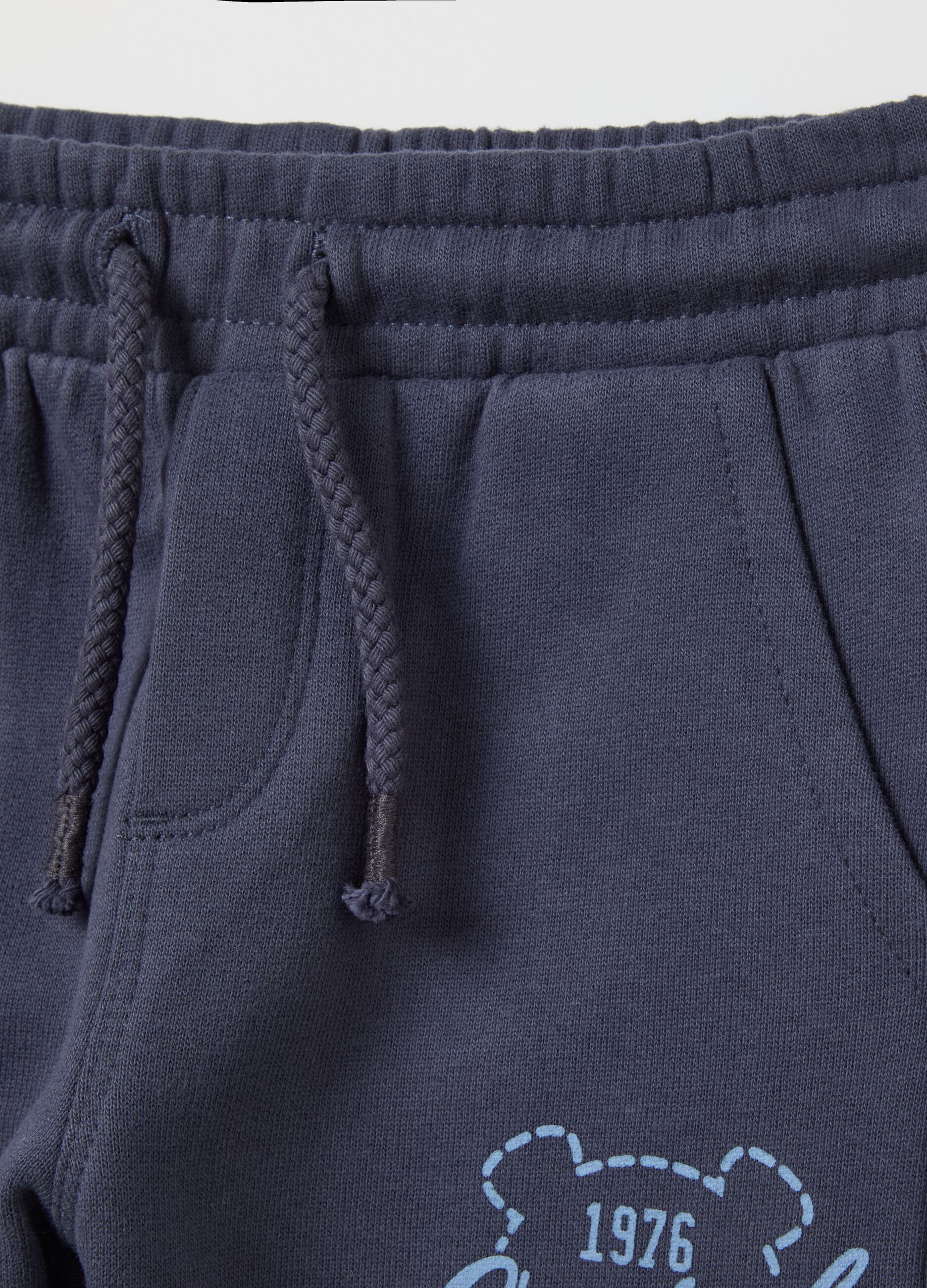 Fleece joggers with drawstring and print