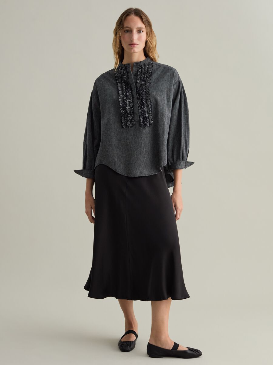 Contemporary blouse with fringed details_0