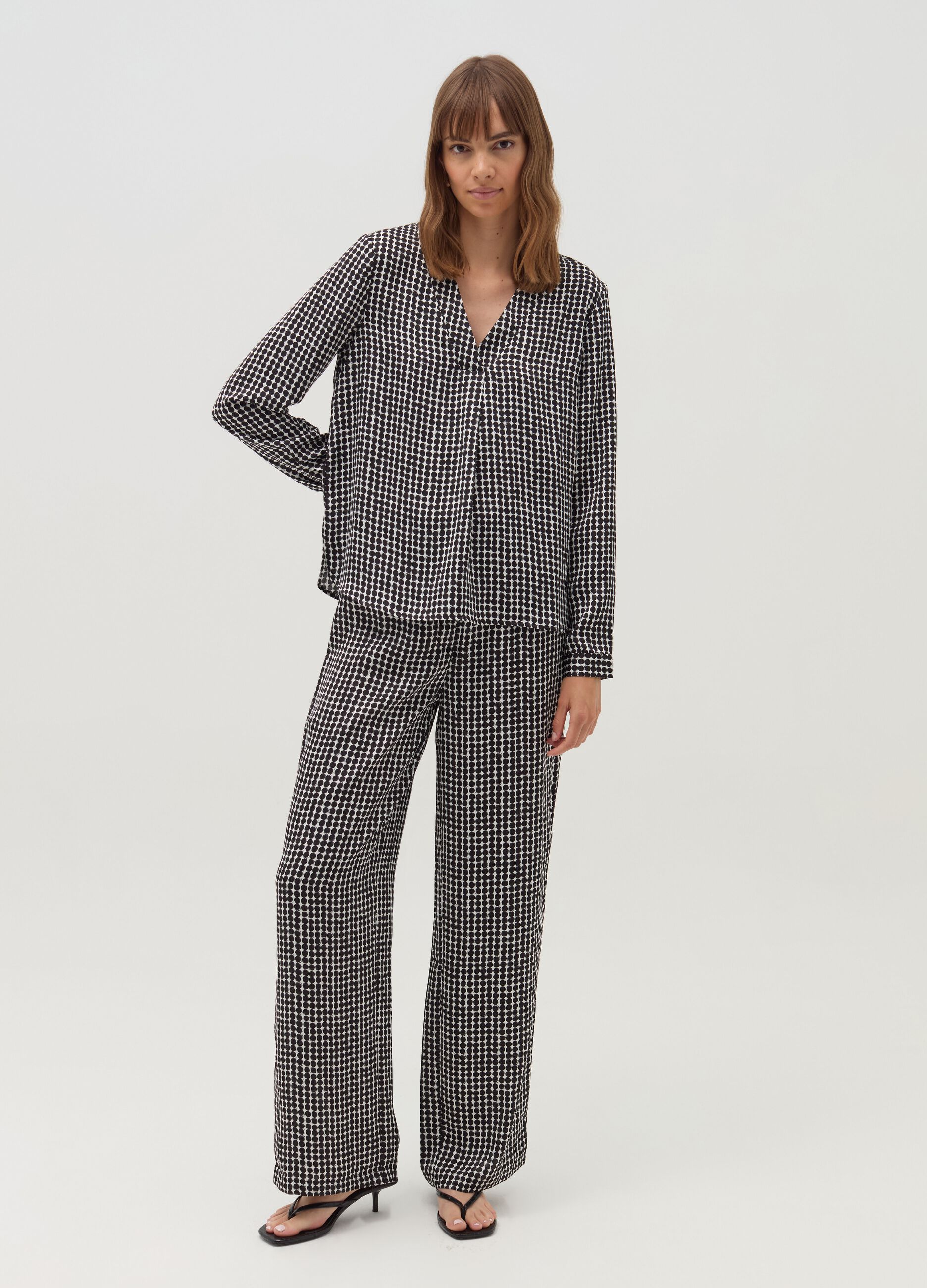 High-rise trousers with polka dot pattern