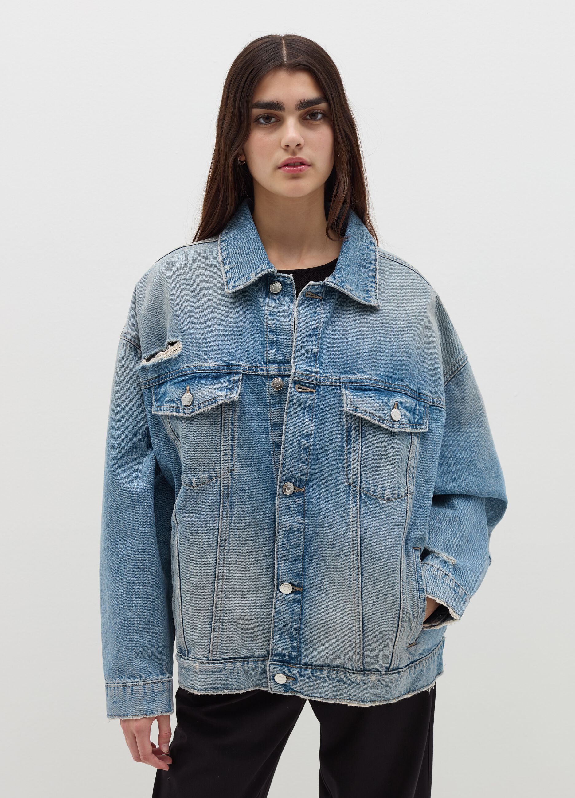 Denim jacket with abrasions