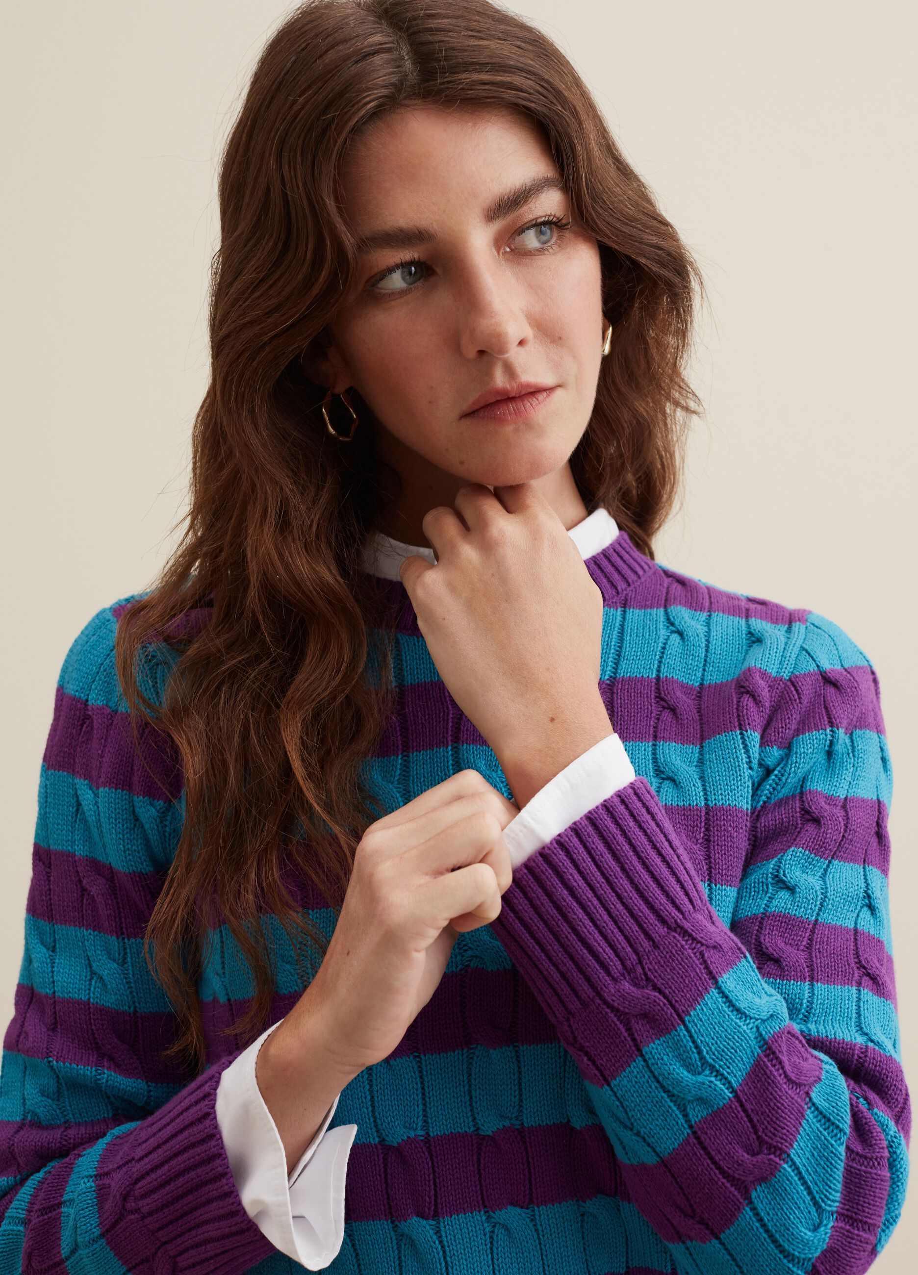 Striped pullover with cable-knit design