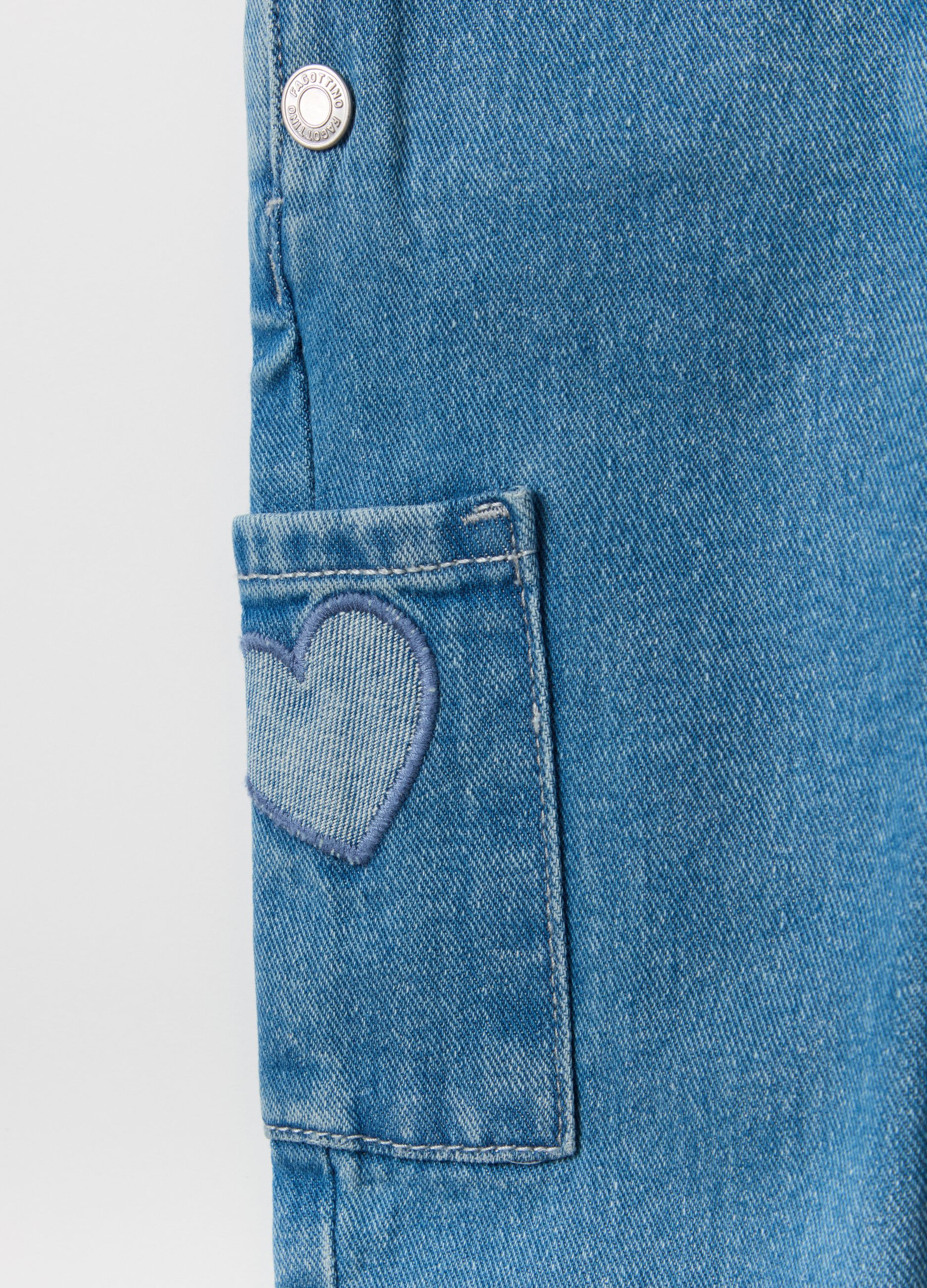 Denim dungarees with hearts embroidery and patch