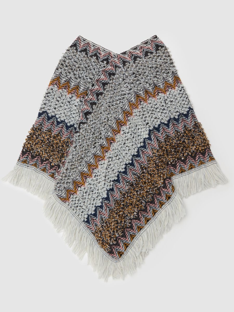 Fringed poncho with patchwork design_0