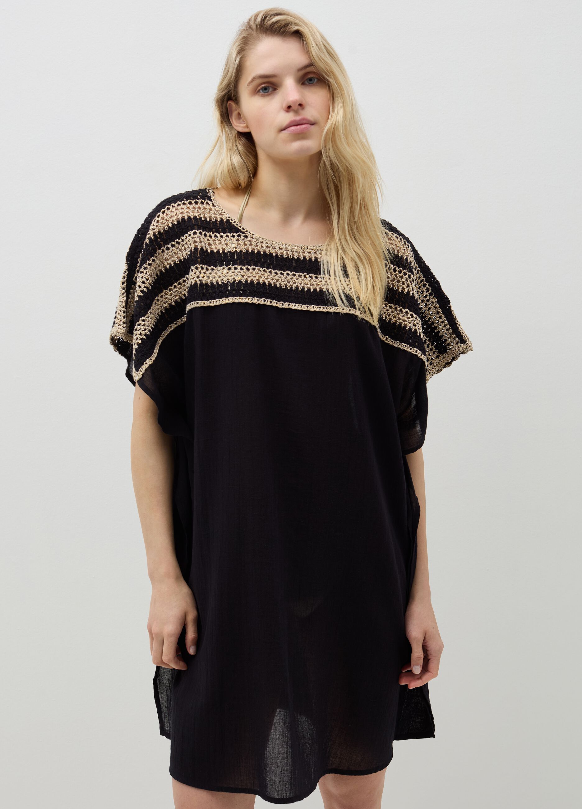 Beach cover-up poncho with crochet insert