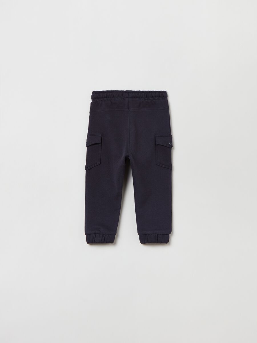 Fleece joggers with pockets and drawstring_1