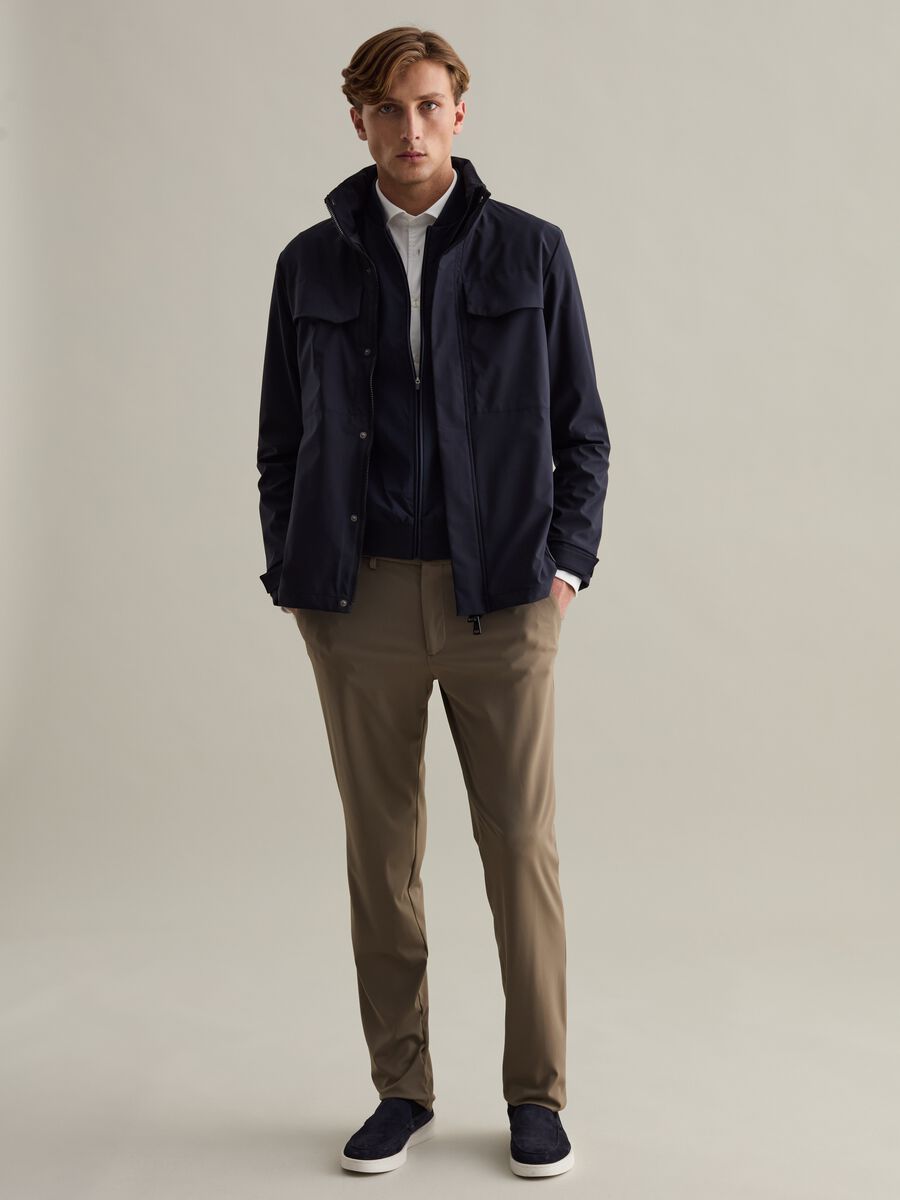 Short jacket in technical fabric with high neck_0