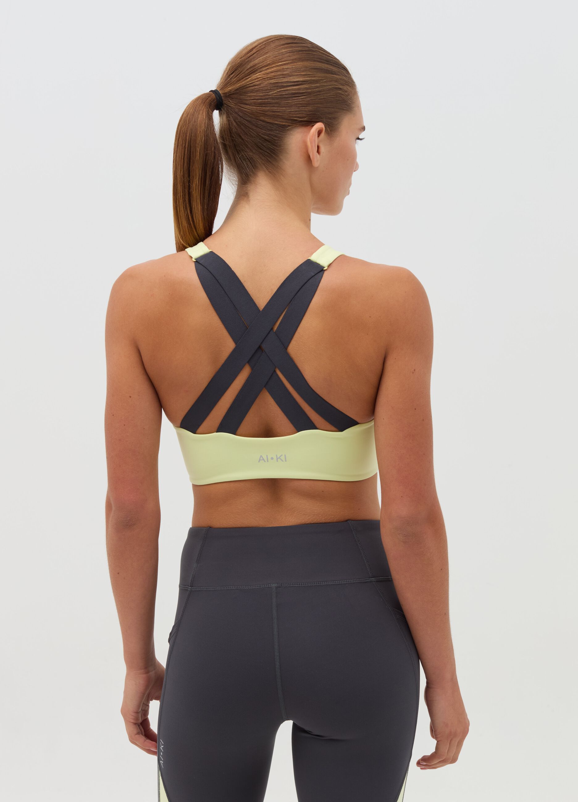 AI•KI sports bra with crossover straps