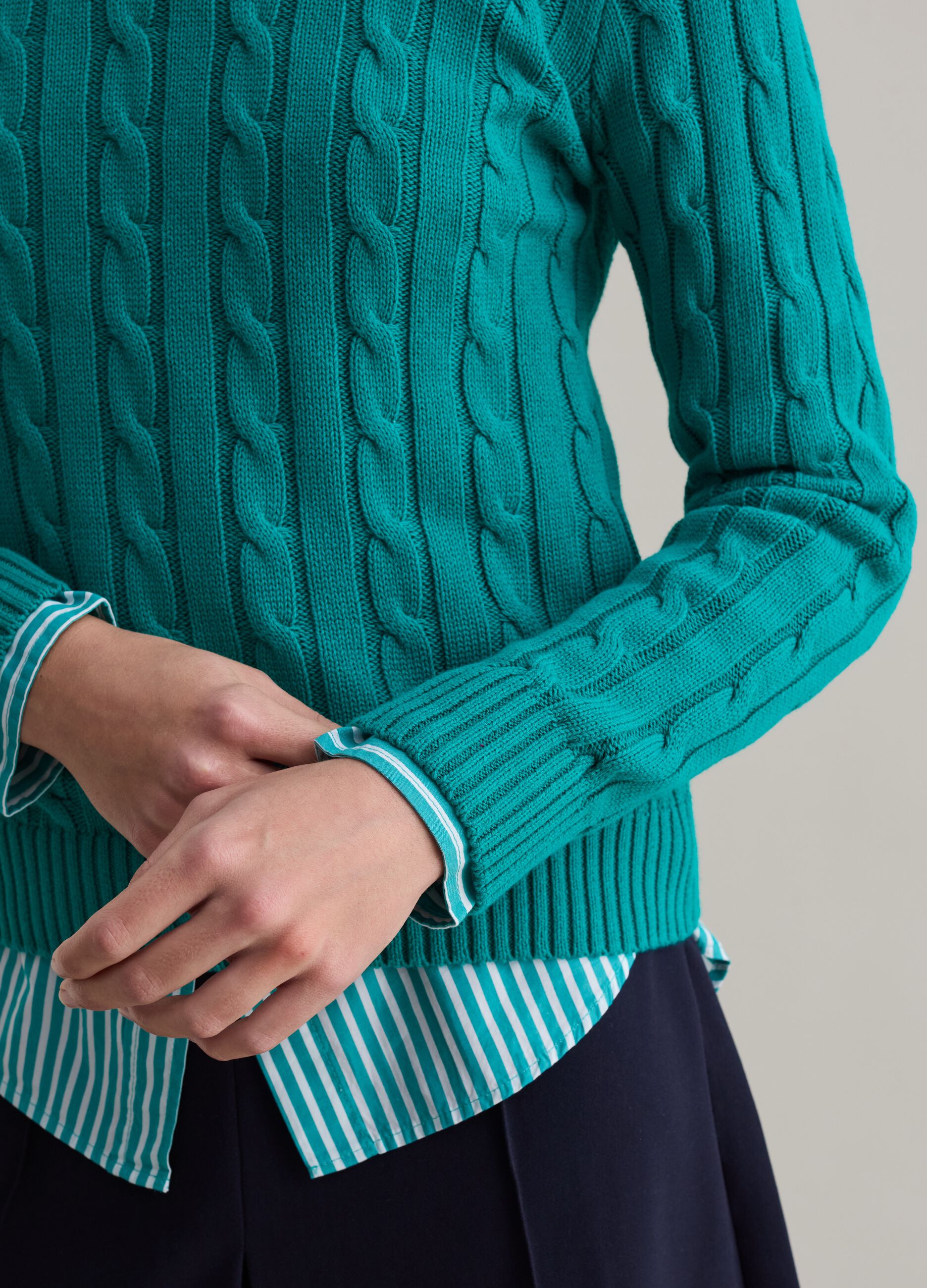 Ribbed pullover with cable-knit design