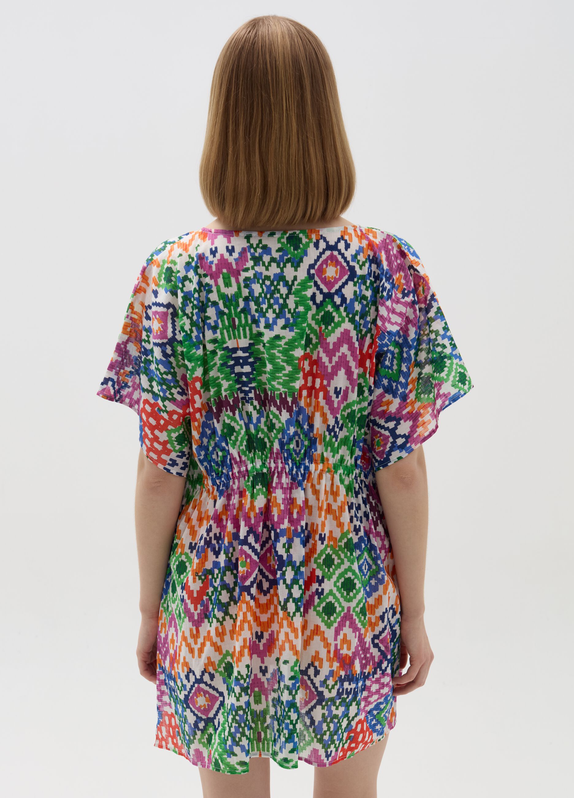 Beach cover-up poncho with ikat print