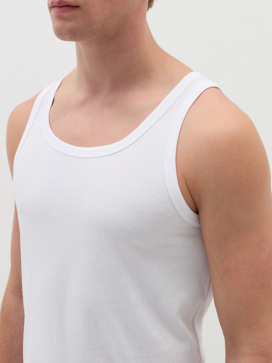 Two-pack racerback vests in solid colour organic cotton_1