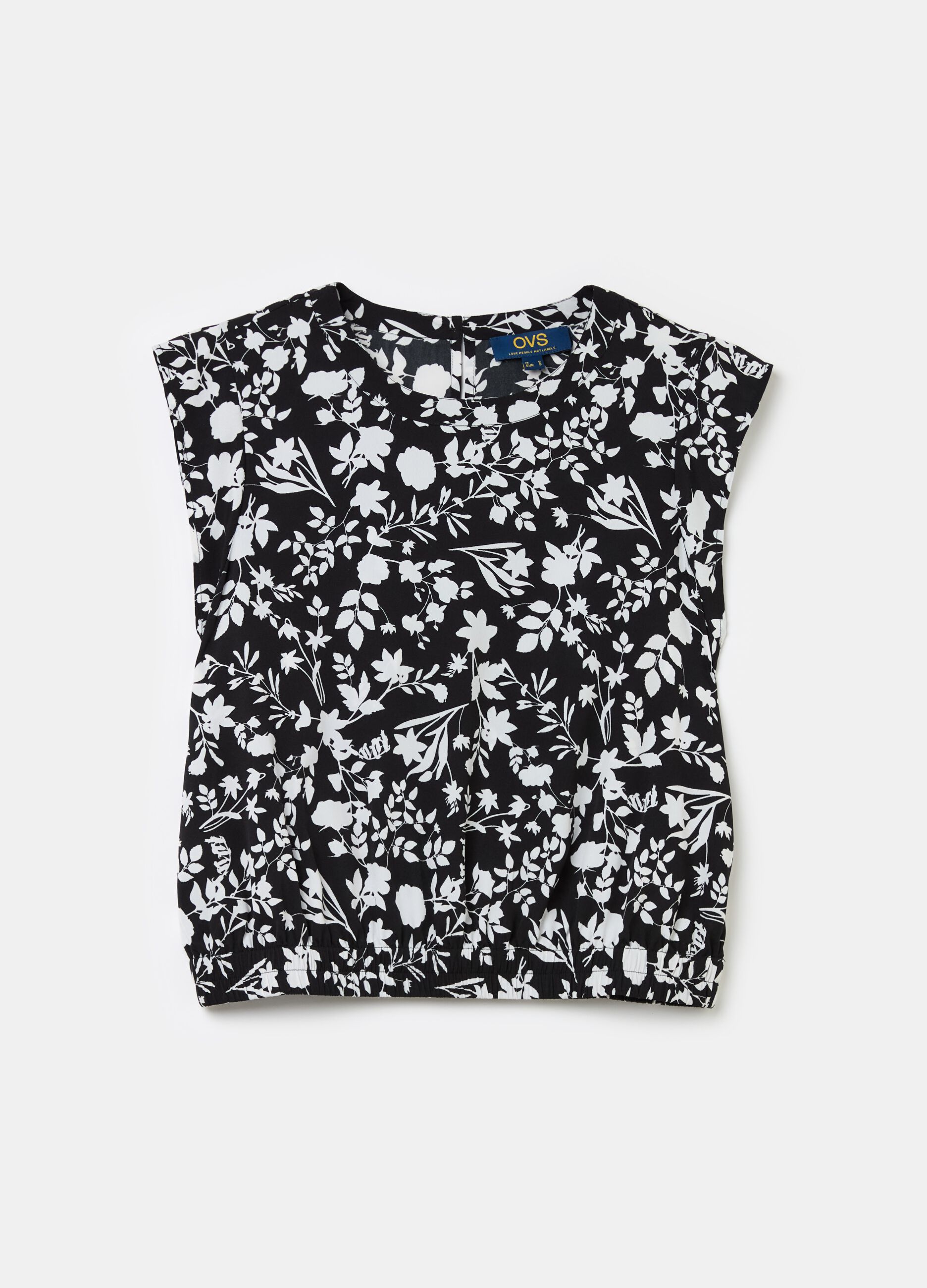 Sleeveless blouse with patterned flounce