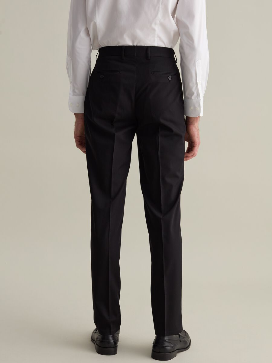 Slim-fit trousers in stretch twill_4