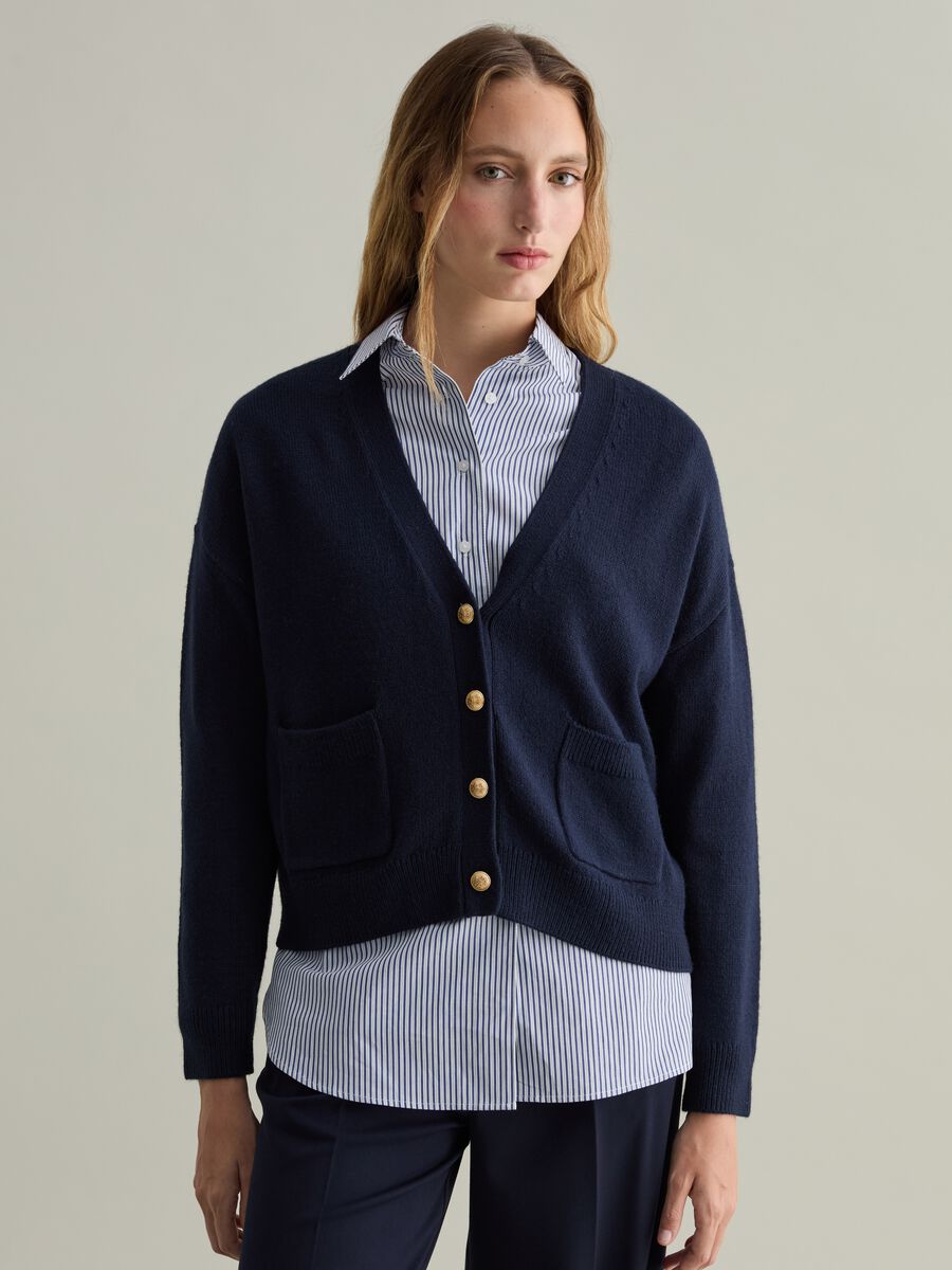 Contemporary cardigan with golden buttons_0