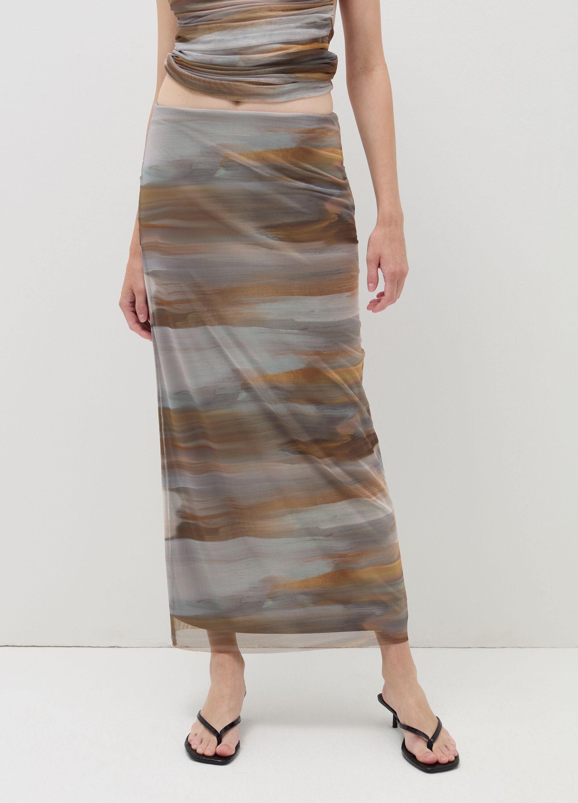 Long skirt with print in mesh