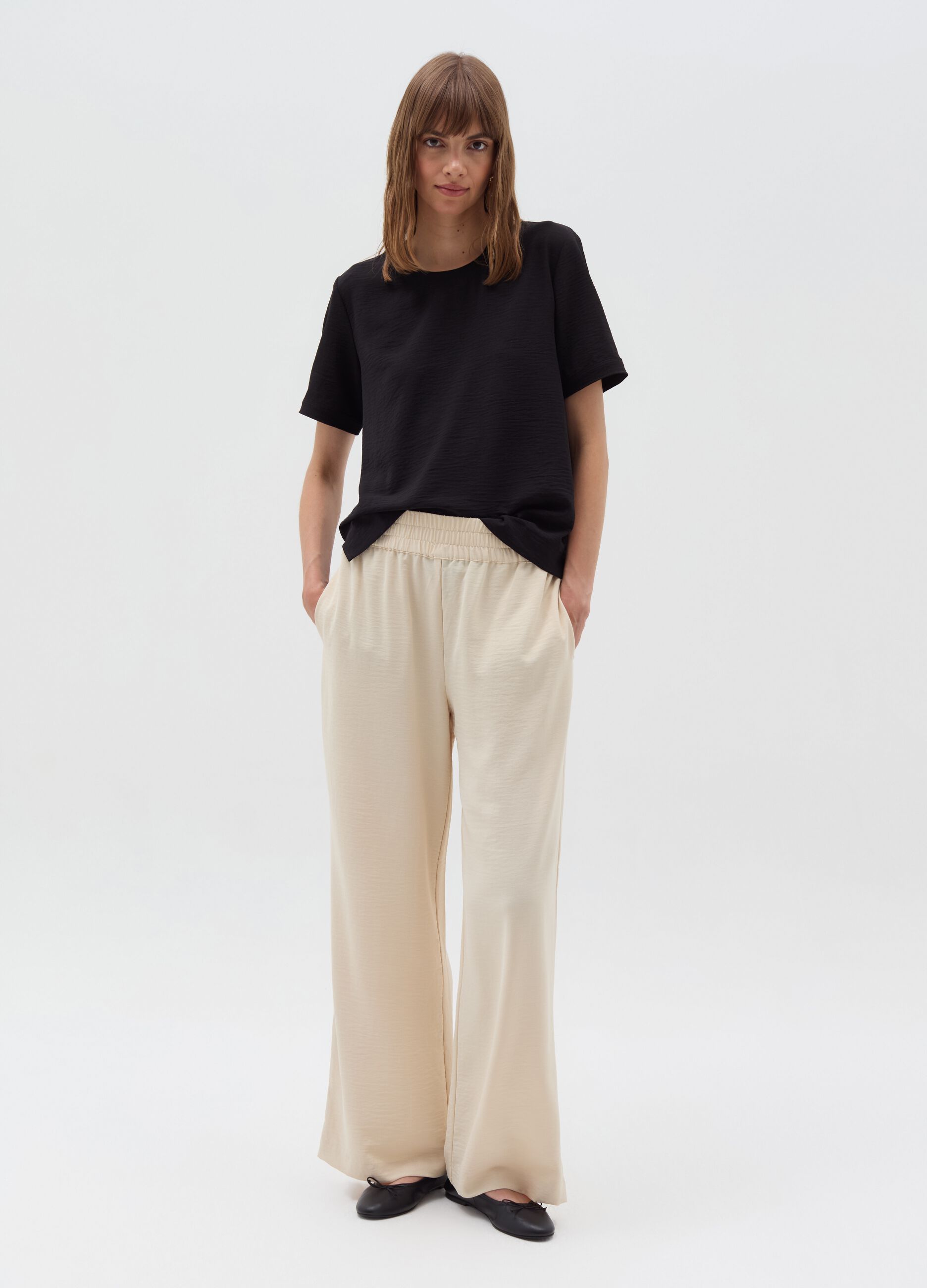 Crinkle-effect fluid trousers