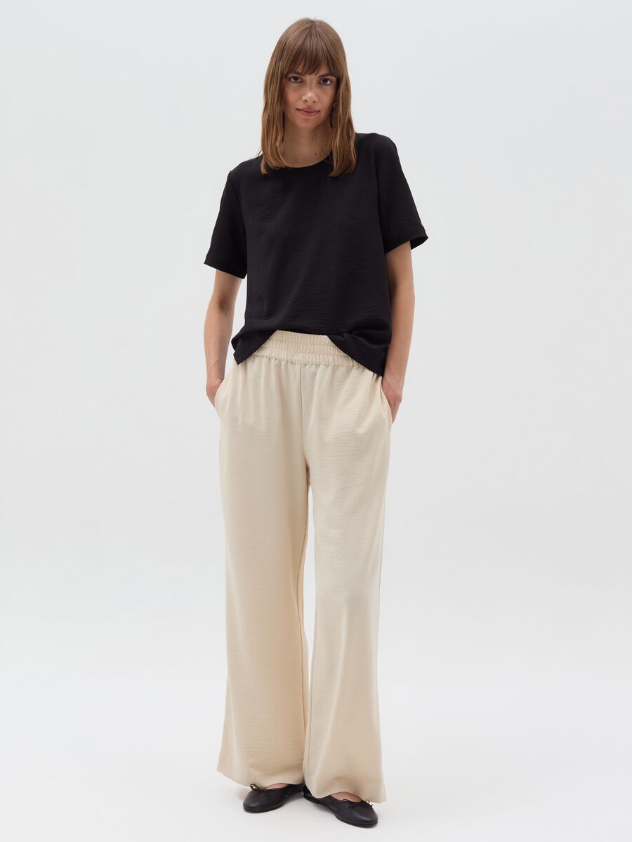 Crinkle-effect fluid trousers_0