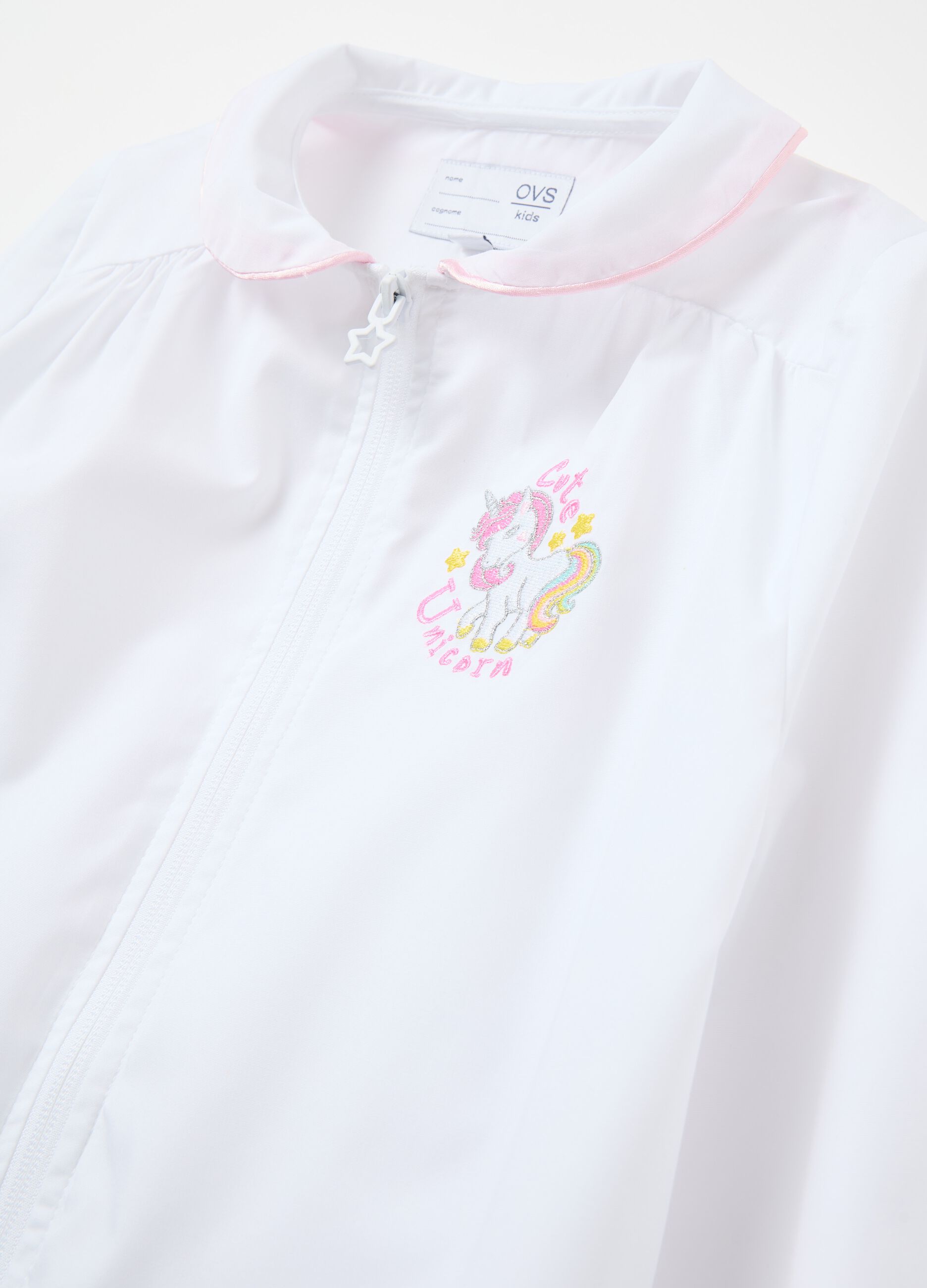 School smock with embroidered unicorn and zip